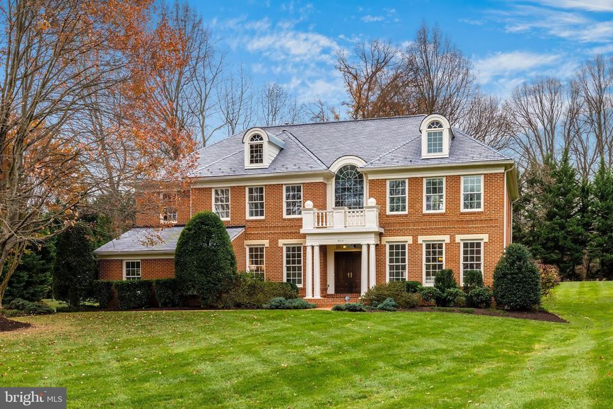 Welcome to this exquisite 4-bedroom, 3.5-bathroom home, nestled on 1.75 beautifully landscaped acres in the highly sought-after Deerfield Pond Great Falls community.  Offering approximately 5,600 square feet of finished living space, this light-filled home perfectly blends luxury, comfort, and functionality.  Its prime location provides easy access to Great Falls Elementary, the Village shops and restaurants, and is just a short drive to Tysons Corner and Reston Town Center.

As you approach the home, you’ll be greeted by a charming front entrance with a brick walkway, manicured plantings, a covered front entry, and double doors that open into a grand two-story foyer. Natural light streams through an expansive arched window, highlighting the dramatic curved staircase and gleaming hardwood floors.  The formal living and dining rooms feature crown molding and rich hardwood flooring, while the dining room includes a built-in bar area—ideal for entertaining.

The heart of the home is the chef’s kitchen, designed for both function and style. It features hardwood floors, a large center island, Thermador wall oven, Thermador 5-burner cooktop, Bosch dishwasher, and custom backsplash.  The adjoining two-story family room offers a bright and airy retreat with a stunning two-story stone fireplace, ceiling fans, and new carpeting. Sliding glass doors open to a large deck with a gazebo, creating the perfect setting for outdoor relaxation or hosting gatherings.  For those seeking a dedicated workspace, the private office with built-in cabinetry and shelving provides a peaceful environment for remote work or study.

Upstairs, the expansive primary suite serves as a luxurious retreat, featuring a tray ceiling, custom built-ins, and two generous walk-in closets with custom shelving.  The ensuite bathroom includes dual vanities, a large soaking tub, and a glass-enclosed shower, offering a tranquil space for relaxation.  Three additional spacious bedrooms, one with an ensuite bath, provide ample space for family or guests.

The lower level of the home is perfect for entertaining, featuring a large recreation room, game area, and wet bar—ideal for family gatherings and social events.  There is also plenty of unfinished storage space, including one room that could easily be transformed into a home gym, theater, or bonus room, and another with a rough-in for a future bathroom.

Additional features include new paint on the main level, upper level hallway, and secondary bedrooms. The home includes a Cummins Onan generator.  Outside, the expansive meticulous yard offers a serene retreat, complete with a sprinkler system.  The home is all brick on four sides.  Roof was replaced about 8 years ago with high-end CertainTeed synthetic slate roof with a 50 year transferable warranty.   There is also a spacious two-car garage with high ceilings.  

Located in the Great Falls ES / Cooper MS / Langley HS school boundary and just minutes from shopping, dining, and major commuter routes, this exceptional home offers the perfect combination of luxury, privacy, and convenience.  Come see all that 9915 Deerfield Pond Drive has to offer!