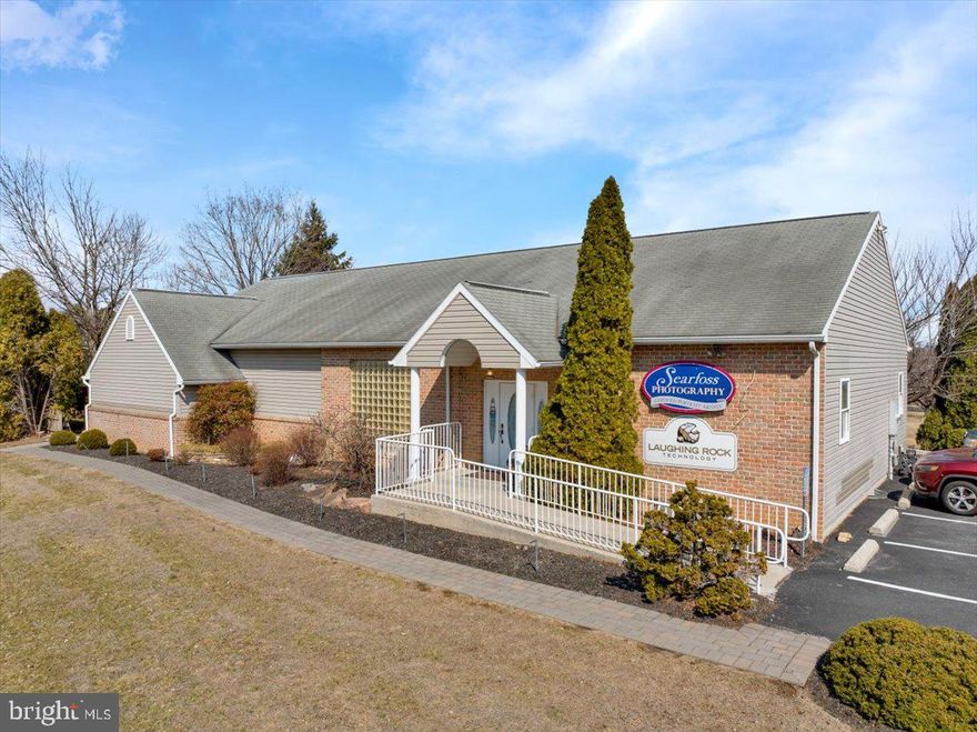 So many possibilities with this space... it used to be a photographer studio for many years!  Since the photo shoot the photographer moved out there's just open area to do whatever you want.  If you're looking for just office space there's another 3000 sq ft below that is already set up for offices with kitchenette and private conference room.   $500/month CAM fee is in addition to the rent, which covers heat, AC, electric, water, sewer, outside maintenance, snow removal and landscaping.  If you are interested in adding another 3000 sq ft Unit 1 Main Level is currently available so you could to all 6000 sq ft for $5875.00 a month.