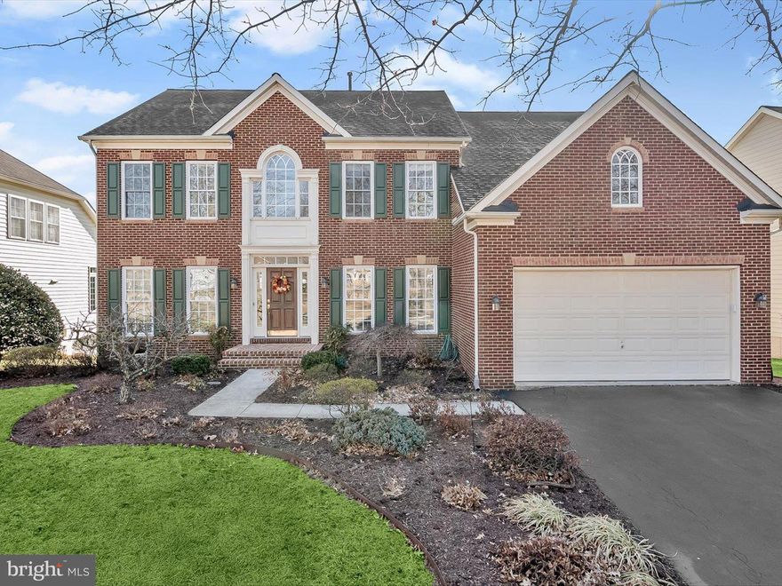 Welcome to 109 Tobias Run, an elegant colonial nestled in the heart of Middletown’s sought-after Glenbrook community, set along the scenic 18th fairway of Richland Golf Course. Offering approximately 4,960 square feet of refined living space, this home is adorned with rich hardwood floors, classic moldings, stately columns, and sun-filled interiors. A grand two-story foyer welcomes you, flanked by formal living and dining rooms that exude sophistication. The eat-in kitchen is a chef’s delight, featuring a center island, ample cabinetry, a pantry, and a bright breakfast room that opens to a deck with breathtaking views. The adjacent two-story family room, anchored by a cozy fireplace, provides the perfect space for relaxation. A private office with French doors, a powder room, and a laundry/mudroom with garage access complete the main level. Upstairs, the luxurious primary suite boasts tray ceilings, a walk-in closet, and an en-suite bath with dual vanities, a soaking tub, and a glass-enclosed shower. Three additional bedrooms and a full bath offer ample space for family and guests. The fabulous lower level is designed for entertaining, featuring a spacious recreation room with a wet bar, a full bath, abundant storage, and walkout access to the beautifully landscaped grounds. Experience timeless elegance and modern comfort in this stunning home!