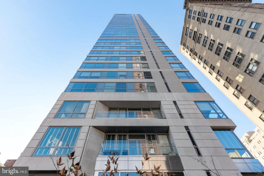 A private &  luxurious estate in the sky awaits its new owner.  Located at the highly coveted 1706 Rittenhouse, a modern, boutique condominium featuring first class service and the finest amenities including no-touch automated valet parking and key-fob-controlled nonstop elevators, 24-hour doormen, concierge, state-of-the-art fitness center with sauna, heated lap pool and hot tub, conference room and a serene, beautifully landscaped Residents Garden with relaxing waterfall and pond as well as an on call chauffeur driven town car.   In 2020 the current owners renovated this home to bring it back to a blank slate and neutral palette. This gorgeous, 3 Bedroom, 2 1/2 Bathroom unit offers 4,166 square feet and spans the entire 10th floor offering breathtaking 360 degree city views from floor to ceiling windows! The open floor plan is ideal for casual living or elegant entertaining. Just steps away from the garage, take the speedy elevator which conveniently opens directly into the large and private vestibule. Enter through tall glass French doors into a spacious and bright living room which features neutral decor, 5 inch  wide hickory plank flooring with a medium walnut stain, tray ceiling detail with custom lighting for added dimension and double doors to a balcony with sweeping views to the South. Adjacent to the living room you will find a formal dining room, currently used as a bar/wine tasting area with an amazing 16 foot balcony with absolutely breathtaking views. The perfectly located Joanne Hudson Chefs kitchen offers ample cabinetry and counter space, new Silestone quartz counters and tile backsplash, Coffee bar, mid century modern light fixtures, a spacious breakfast nook, large breakfast bar, commercial grade stainless steel appliances including a Wolf range, wall oven and microwave and Sub-Zero refrigerator and freezer. Just off the kitchen, pocket doors will lead you into the spacious and quiet home office. This space can be converted to a 4th bedroom or used as a home gym / peloton room; the options are endless. Beyond the office you will find a sizable guest bedroom (currently being used as a den) with unbelievable city views. The previous owner used this room as an art studio but there will soon be a gorgeous, custom California Closets built-in desk area and closet with matching media credenza installed by late Spring. Renderings available upon request. The opposite wing of the residence features a luxurious corner owners bedroom suite with custom built entire wall and walk-in closets and en-suite bathroom appointed in marble with a double vanity, private commode, soaking tub and seamless glass enclosed walk-in shower. This wing also features a second guest bedroom which is spacious, bright and offers sunrise city views with easy access to a full hall bathroom.   Additional home highlights include recessed lighting throughout, custom window treatments throughout, powder room, coat closet, laundry room with utility sink and side-by-side washer and dryer, and a utility room with access to the service elevator. One SUV sized Parking Space in the building's automated garage and one storage space is included. . The 1/2 bathroom on the West side of the condo can easily be converted to a 3rd full bathroom.  Priced impeccably compared to the comparable sales in the building!  There are world-class restaurants and retailers within a three block radius. 1706 Rittenhouse is within close walking distance to the Market Street office corridor, The Avenue of the Arts and University City. 30th Street Station and Philadelphia International Airport are only minutes away.