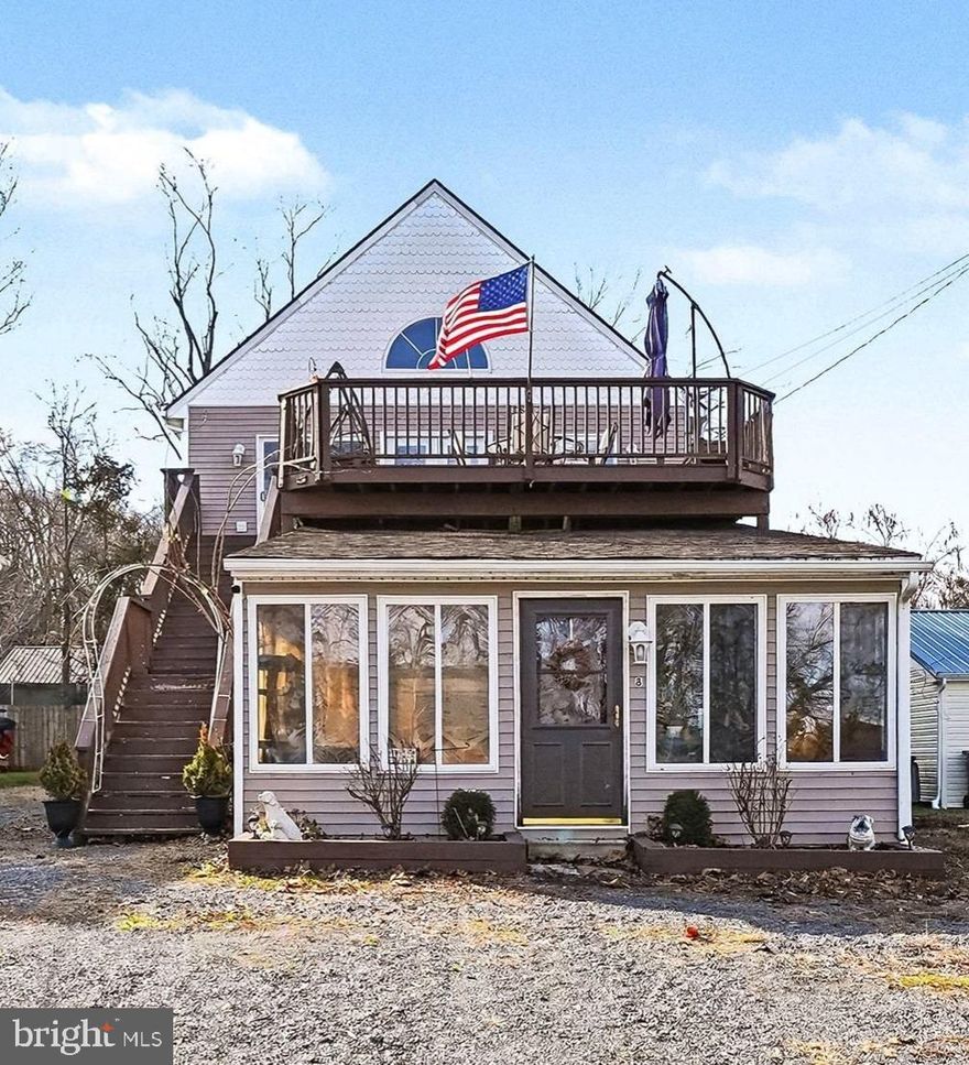 Welcome to your dream water-community retreat in Carpenter’s Point, one of the most charming hidden gems in Perryville. Tucked away from the hustle and bustle yet conveniently close to everyday amenities, this property offers breathtaking waterviews of the North East River and over 3,000 square feet of versatile living space designed for comfort, entertaining, and multi-generational living.

The upper living level is an entertainers dream, featuring expansive glass sliders that open to a 26' x 19' deck with a view of the water—perfect for morning coffee or sunset gatherings. The open-concept kitchen, dining, and living areas flow seamlessly together, anchored by a large kitchen island ideal for hosting family and friends. Down the hall, you’ll find two spacious bedrooms and a full bath complete with a soaking tub and oversized shower, creating a true spa-like retreat.

A spiral staircase leads to the expansive loft overlooking the main living area—an ideal space for a home office, additional bedroom, playroom, or creative studio.

The main level adds incredible flexibility, offering a large open family room area with sliders to the backyard, a bedroom, full bath, and kitchenette—perfect for guests, extended family, or private living quarters. Pellet stove included (see disclosures). New roof 2023 and new water heater a few month's ago!

As if that weren’t enough, this property also features a currently separate front cottage with its own sunroom, living room, kitchen, bedroom, and full bath. Ideal as an in-law suite, guest house, or income-producing rental, the cottage can also be reconnected to the main home to expand the primary main floor plan.

If you’ve been dreaming of a peaceful water-oriented lifestyle, surrounded by nature and community charm while still staying close to it all—this is the one.  Attention boaters! Access to private commuity boat ramps wtih mooring rights (verify with the county). Nearby is Hollywood Casino, Great Wolf Lodge and other local water communities of Port Deposit, Charlestown and North East. Come experience the lifestyle for yourself.