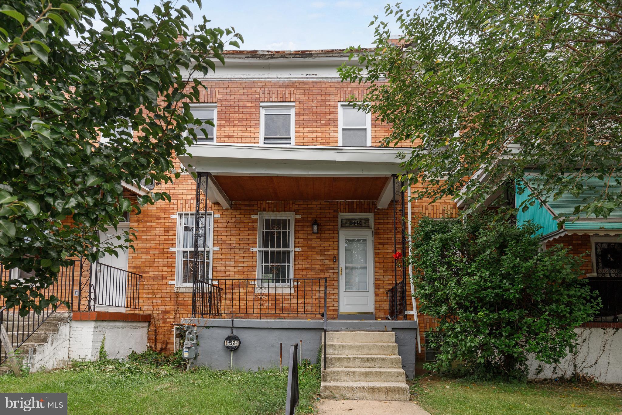 Charming porch-front townhome in Baltimore’s Easterwood neighborhood offering a blend of modern updates and classic character. The main level features an updated kitchen with stainless steel appliances, refreshed cabinetry, and contemporary finishes. Bathrooms have also been updated with stylish fixtures and a clean, timeless look.
The upper level includes a comfortable primary suite with a private bath, along with two additional bedrooms that provide generous closet space and flexibility for guests, family, or a home office.
Enjoy outdoor living in the fenced backyard, complete with a brand-new fence—perfect for relaxing, entertaining, or gardening in a private setting.
Ideally located near Mondawmin Mall and Coppin State University, and only minutes from Gwynns Falls Park and Druid Hill Park, this home offers convenient access to shopping, dining, recreation, and commuter routes. Move-in ready and waiting for its new owner.