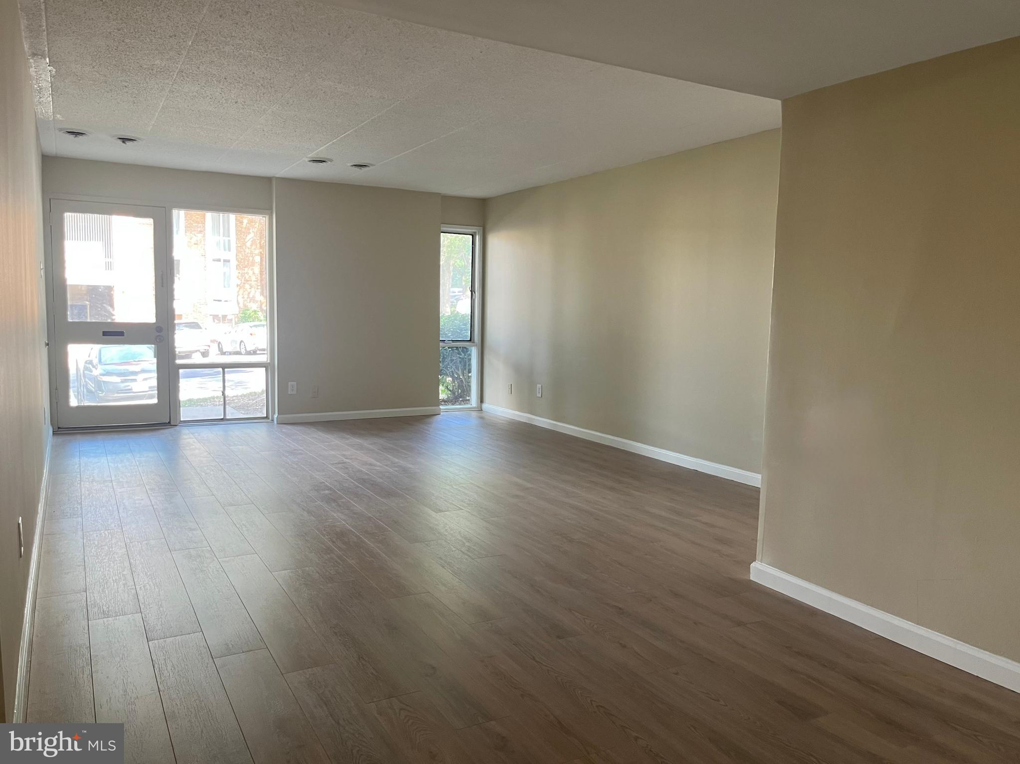 Welcome to 2647 Redcoat Dr #130, a beautifully updated and sunlit 1-bedroom, 1-bath condo in the heart of the sought-after Huntington Club community. This renovated and move-in ready home offers the perfect combination of comfort, value, and unbeatable commuter convenience. This home features a spacious living room with access to the exterior patio, a dining area with kitchen pass-through, and a generously sized bedroom with walk-in closet all with NEW wide White Oak LVP flooring. The all ALL NEW (yes, EVERYTHING) modern kitchen with white shaker cabinetry, large format ceramic tile, marble look countertops, extra deep single basin sink, and pristine Stainless Steel GE Appliance Suite (Gas Range, Microwave, Dishwasher, and French Door Refrigerator) is ready to prepare meals for one or for many. Just a short walk to the Yellow Line Huntington Metro, and minutes from Amazon HQ2, DCA Airport, Fort Belvoir, and major highways—this location is a commuter’s dream.
The $756/month condo fee covers ALL utilities (electricity, gas, water), HVAC maintenance, exterior building care, trash removal, and groundskeeping—offering worry-free living with no surprise bills. Located in a pet-friendly community, residents enjoy access to many amenities including an outdoor pool, tennis courts, picnic area, playgrounds, and a fitness center. Don't miss this incredible opportunity to own in a growing neighborhood with strong rental and resale potential. Schedule your private showing today! This is an excellent opportunity for veterans, first-time buyers, or investors. Unbeatable Location: Walking distance to Huntington Metro! Effortless commute to: Amazon 🔹 The Pentagon 🔹 Fort Belvoir 🔹 U.S. Patent & Trade Office 🔹 Hoffman Center 🔹 National Science Foundation