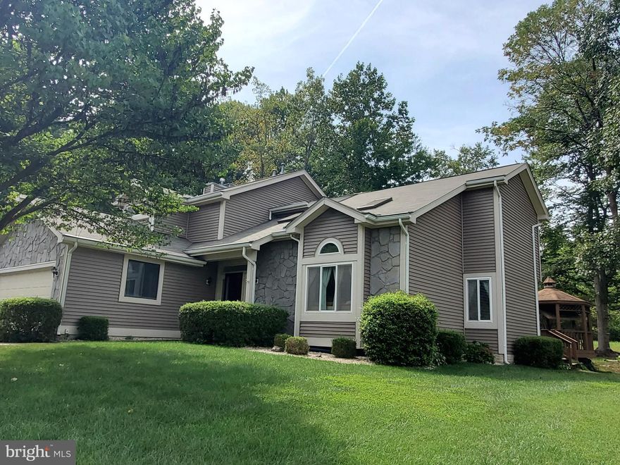 STUNNING CONTEMPORARY, NESTLED WITHIN SEQUOIA ESTATES...THIS HOME PRESENTS 3-LEVELS, 4 BEDROOMS , 2.5 BATHS AND 2 FIREPLACES...AS YOU APPROACH YOU WILL SEE A STONE FACADE AND COVERED PORCH...UPON ENTERING YOU ARE GREETED BY CATHEDRAL CEILINGS, AND GLEAMING HARDWOODS...TOWARDS YOUR RIGHT, YOU WILL SEE A TWO STORY LIVING ROOM AND SEPARATE DINING ROOM...IN THE REAR YOU WILL DISCOVER A BREATHTAKING KITCHEN AND FAMILY ROOM SETTING (IDEAL FOR ENTERTAINING)...UPGRADED KITCHEN  FEATURES INCLUDE NEW QUARTZ COUNTERTOPS, HARDWOOD FLOORING, APPLIANCES AND A COFFEE BAR...LARGE FAMILY ROOM  OFFERS OVERSIZED WINDOWS AND A COZY FIREPLACE...AN OPEN STAIRCASE LEADS TO THE UPPER LEVEL WHERE THE PRIMARY BEDROOM PRESENTS,  VAULTED CEILING ( WITH A FAN ), DELUXE BATH (WITH LARGE  SOAKING TUB AND DUAL SINKS), WALK-IN CLOSET AND A GAS FIREPLACE... THERE ARE ALSO 3 ADDITIONAL BEDROOMS AND A LARGE HALL BATH ( WITH DUAL SINKS)...GOING BACK TOWARDS THE KITCHEN, YOU WILL FIND, SLIDING GLASS DOORS THAT LEAD YOU TO AN AMAZING FULL LENGTH, TWO TIER, TREX DECK WITH HOT TUB AND GAZEBO... AN INCREDIBLE WOODED LANDSCAPE,  AWAITS YOU, AND WILL ENTICE  YOU, TO STOP, ENGAGE, AND ABSORB THE SCENERY ..RECENT UPGRADES  INCLUDE THE ROOF,  BOTH HVAC SYSTEMS, A HOT WATER HEATER, GARAGE DOOR, AND NEW INSULATION HAS BEEN INSTALLED IN THE ATTIC AND BASEMENT...THE LAUNDRY ROOM IS LOCATED ON THE MAIN LEVEL...COME SEE THIS GEM AND MAKE IT YOURS!!!