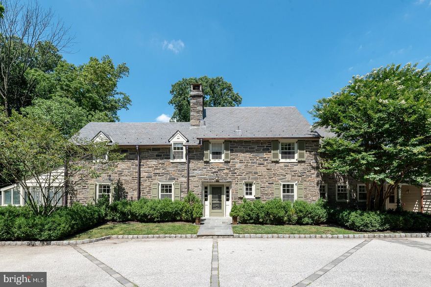 Prepare to be amazed by this spectacular estate in the most coveted location of Huntingdon Valley in Montgomery County, offering breathtaking winter views of the Huntingdon Valley Country Club clubhouse! This stunning 5/6 bedroom, 4 full bathroom, and 2 half bathroom farmhouse, with its classic Germantown stone and elegant slate roof, seamlessly combines timeless charm with modern luxury.
 
As you arrive, the expansive beautifully landscaped courtyard, adorned with decorative cobblestone, welcomes you with space for 8 cars, electric car charging station plus a two-car attached garage complete with walk-up storage. Step through the impressive two-story foyer, and you’ll immediately appreciate the superior craftsmanship and meticulous attention to detail.
 
The heart of this home is the brand-new chef’s kitchen, open to the spacious sun lit great room and ready to inspire your culinary adventures! Equipped with top-of-the-line appliances, including a Subzero fridge, KitchenAid Superba double oven, Thermador five-burner gas stove, and Bosch dishwasher, this kitchen is a dream come true. The butler's pantry, featuring Subzero wine storage and a Countryman ice maker, adds an extra touch of convenience.
Among the many highlights are the two master bedroom suites, each offering a serene retreat. Recent improvements enhance this home’s allure, including a new art studio with custom cabinetry, an integrated sound system, copper gutters (2019), an updated bathroom in the "maid’s room" (2019), a new air conditioning unit (2018), rear yard fencing (2017), and a custom Lapp-built shed (2017).
The luxurious master suite boasts an oversized claw foot soaker tub, an Italian marble double shower with steam, and dual vanity sinks. Enjoy the cozy ambiance of four fireplaces, including three wood-burning and one gas in the master bedroom. The house features three-zoned integrated sound systems, providing the perfect soundtrack throughout the great room, kitchen, patio, master bedroom suite, art studio, and downstairs media room.
Imagine relaxing in the large garden room/solarium with a soapstone sink over looking the pool, or exploring the third-story attic with its impressive 9+ foot ceilings. The additional master suite with a tiled bathroom shower offers even more comfort and space. The 200-amp service, wired with a transfer switch for easy whole-house generator connection, ensures peace of mind.
Step outside to discover a new pool with a hot tub and extensive landscaping, adding to the home’s appeal. The covered, elaborate enclosed porch with skylights and flagstone flooring is perfect for year-round enjoyment. The property also includes a custom-built shed with lighting and additional storage behind the garage.
This home truly has it all, including a pottery barn bar in the "man cave," radon mitigation system, three-zone heating and cooling, dual swing purpose interior doors to the main bedroom, outside wired low voltage LED landscape lighting, and an abundance of built-in cabinets with custom self-closing drawers.
This is a Must See! Don’t miss the opportunity to own this exceptional estate, where luxury meets comfort and every detail has been thoughtfully considered. Welcome home!