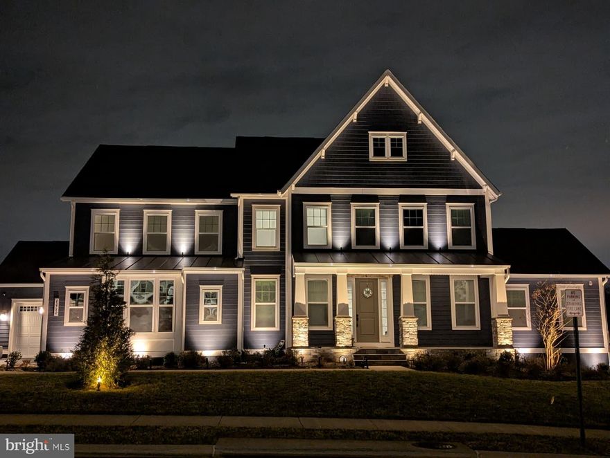 Welcome to this thoughtfully designed and beautifully upgraded single-family detached home in the highly desirable Hartland community of Virginia—perfectly tailored for modern family living. This home offers a convenient first-floor guest suite, a spacious and upgraded Chef's kitchen/appliances ideal for family meals and gatherings, and a large backyard providing plenty of room for play, entertaining, and outdoor fun.

Designed with families in mind, the home is baby-proofed on the main level and equipped with ceiling fans in all bedrooms. Smart-home features include smart and dimmable lighting, remote operating smart blinds, smart appliances, Nest thermostat, smart garage doors, Ring doorbell and exterior cameras, and pre-installed door sensors (self-subscription required). Three ceiling-mounted mesh Wi-Fi routers deliver reliable, high-speed coverage across all three levels and the backyard—ideal for work, school, and streaming.

Practical upgrades include custom closets in the primary bedroom, built-in laundry room cabinetry with off-the-floor washer and dryer access, a water softener, RO water purification system, electric vehicle charging point, smart sprinkler system, and quarterly pest control treatment. The 3-car garage offers ample storage with overhead racks and includes an additional refrigerator.

Families will love the community’s outstanding amenities, including a clubhouse with gym, pools, and event space, tennis, pickleball, and basketball courts, a children’s park, and access to numerous walking and nature trails. Verizon gigabit internet, twice-weekly trash and recycling service, and clubhouse access are included. This home offers comfort, safety, and space in a vibrant, family-friendly neighborhood.