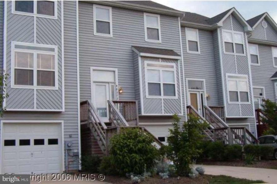 Shows like new....beautiful...new carpeting and paint.  Deck off kitchen and backs up to woods..Family room in lower lever with gas fireplace and 1/2 bath with walk-out onto patio.  1 car garage...Has access to Bay and only 10 minutes to Pax River NAS....Laundry on lower lever, ..Available Now  Carpets look like new.   Shows great  No pets