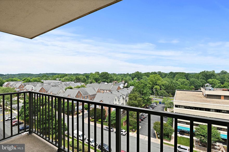 Multiple Offers Received **Offers Due Monday 6/10/24 at Noon**  Rarely available 1 BR, 1.5 bath Upper Floor unit with Window/Balcony Westward views OVER  office building toward trees and mountains. Largest of the 1 BR models at McLean House North.  95% of the windows are new (June 2024), Freshly painted with 2-3 yr old  neutral carpet.  Heat, A/C, Electric, Water, Sewer, & Trash included in condo fee.  Condo selling 'As-Is' - Kitchen, Baths, and appliances are dated but appear functioning and unit is clean and vacant. Washer & Dryer in unit, storage bins available through the association, and off-street parking in lot (permit required.)  Walk to grocery and McLean stores, shops, & restaurants!