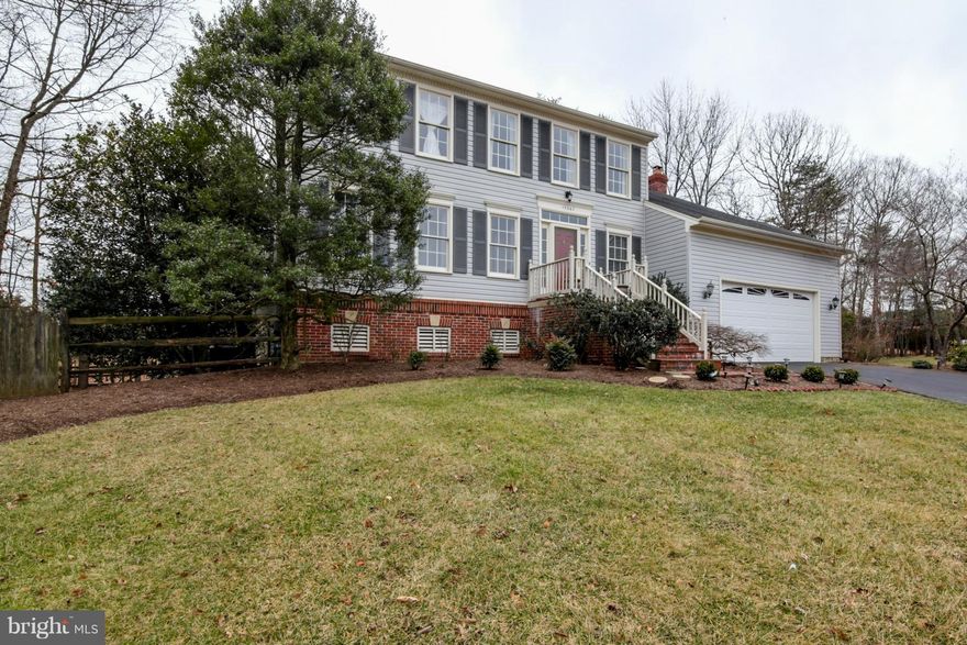 DON'T MISS THIS! MUST SEE RECENT UPGRADES: NEW Hardwood Floors throughout Main Level; Kitchen with New Cabinets, Granite, Stainless; UPGRADED LIGHTING Throughout; Updated Bathrooms; Lower Level with NEW carpet, Fresh Paint, New Door Walks out to Patio and Fenced Yard!