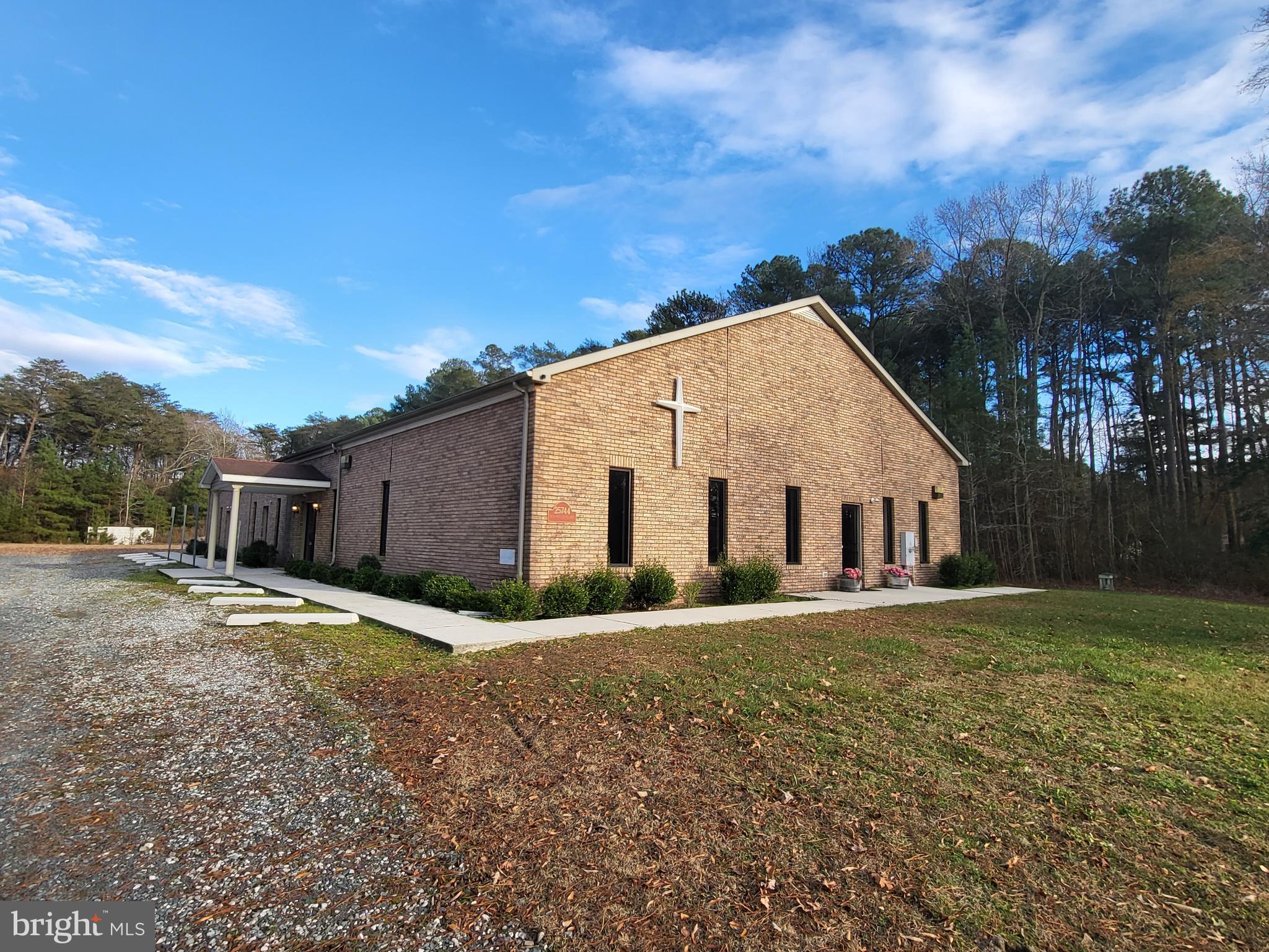 HUGE PRICE IMPROVEMENT!!! Beautiful edifice that's great for pastors who have an establish congregation, or possibly looking to grow your fellowship. This is a turn-key sanctuary, complete with chairs, sound system, conference room furnishings and security cameras. With more and enough room to accommodate a large fellowship!! Building is 7200 sq ft with seating for approximately 300, two full bathrooms, a men's and ladies' restroom, two conference rooms and five offices. There is also an additional annex that can accommodate light gatherings/receptions. Church sits on 4.48 acres of land, has an unpaved parking lot that parks around 50 vehicles.