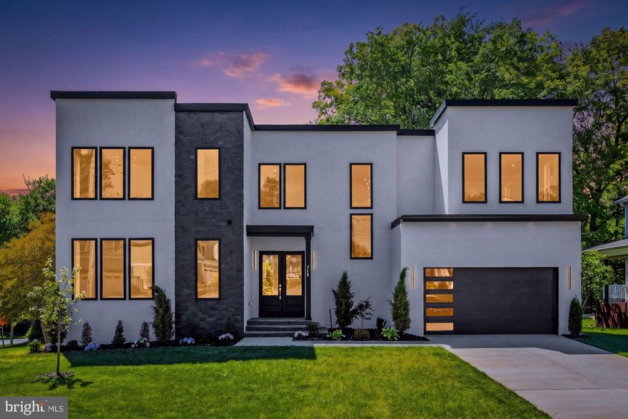 Modern luxury meets everyday convenience in this newly built 2025 custom home by Lords Meadow LLC, ideally located in the heart of Vienna with no HOA. Offering 6 bedrooms, 6.5 baths, and 6,299 square feet on a premium corner lot, this striking residence showcases bold contemporary architecture, high-end finishes, and thoughtfully designed living spaces. The main level features an open concept layout perfect for entertaining, including spacious living and dining areas, a private home office, and a main level bedroom suite ideal for guests or multi-generational living. At the heart of the home is a stunning chef’s kitchen equipped with top-of-the-line Thermador appliances, including a 48” refrigerator, 48” dual fuel range with hood, dual dishwashers, drawer microwave, granite countertops, and an impressive 10x5 waterfall island. Large Andersen windows fill the home with natural light, while two fireplaces add warmth and sophistication. Upstairs, the luxurious owner’s suite offers dual walk-in closets and a spa inspired bath with marble walls and flooring, while three additional spacious bedrooms with ensuite bathrooms, walk-in closets and an upper level laundry room provide both comfort and convenience. A versatile loft sitting area creates the perfect flex space for a lounge, study area, or secondary living room. The finished lower level is designed for recreation and entertaining with a large open space, wet bar, private gym, 6th bedroom, full bath and endless flexibility for movie nights, gatherings, or extended living. 10' ceilings on main and upper levels, 9' ceilings in the lower level. Outside, enjoy a spacious deck ideal for outdoor dining and entertaining, an oversized garage with ample storage, and a premium 0.25 acre corner lot. Just minutes from Vienna Metro, I-66, shopping, dining, and all that Vienna has to offer, this exceptional home delivers luxury living in one of Northern Virginia’s most desirable locations. Top rated Marshall Road/ Thoreau/Madison Pyramid. *Dining room, primary bedroom, living room, and lower level include virtually staged photos.
