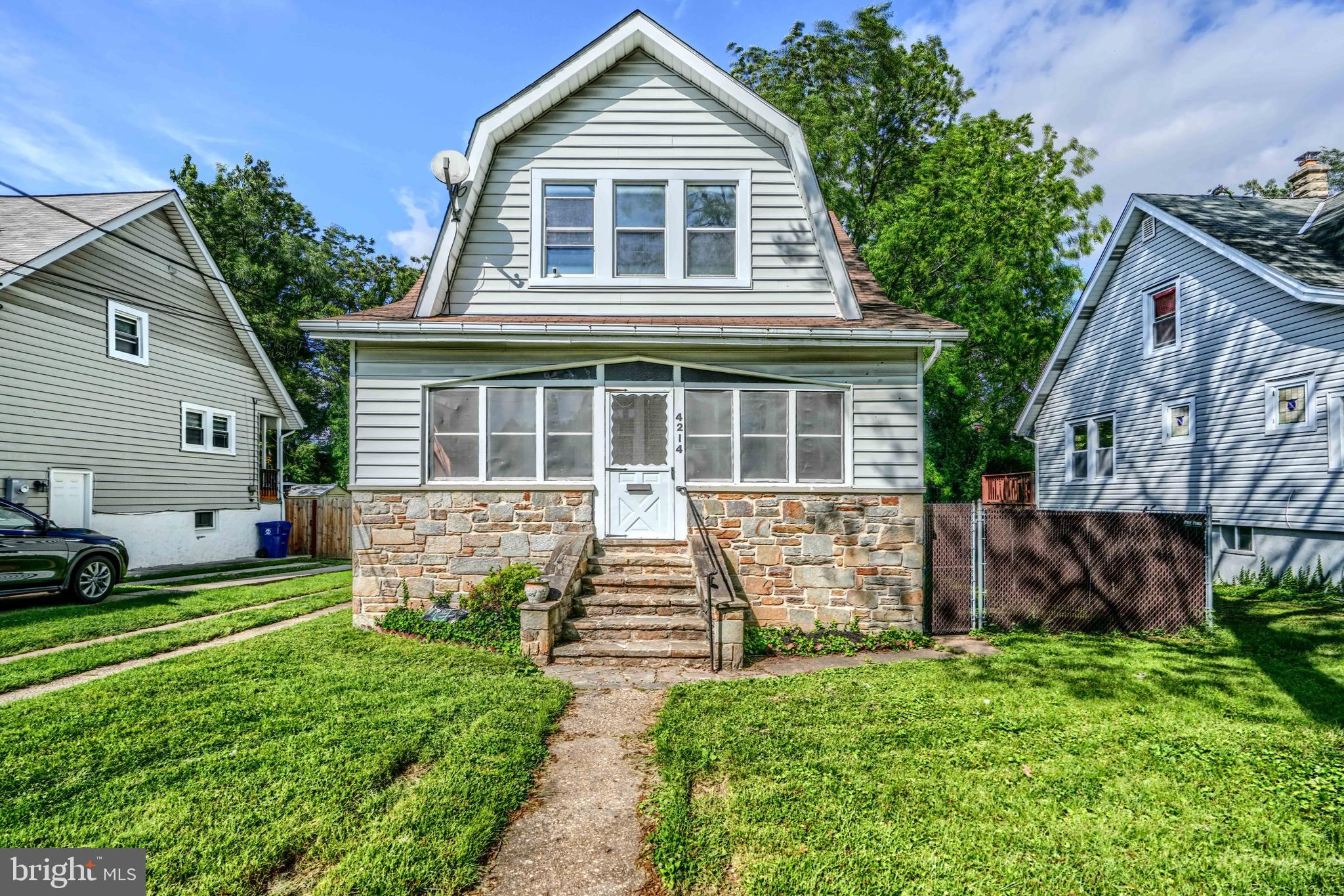 Welcome home to this charming home on a quiet street in Hamilton. You will love the classic architecture and features of this timeless design... and the potential it has to truly make it a home of your own! Open foyer floor plan leading to a large living and dining area. Check out the original hardwoods throughout the home; they are fantastic. Large kitchen area that can become the social center of the home with updated appliances. Upstairs you'll find three large bedrooms and more of those wonderful hardwood floors. Plenty of attic and closet space upstairs as well. The basement is a large space that is ready to become your sports cave, more living space, a great hosting space... you name it. Backyard is huge and features a large detached garage that would be great for parking or a workshop. There's even a full cut-through driveway; a very unique feature! Perfect home for someone with a vision to make a modern living space with classic features. It's a good life!