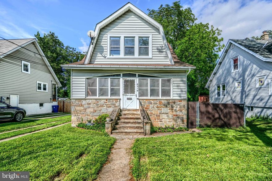 Welcome home to this charming home on a quiet street in Hamilton. You will love the classic architecture and features of this timeless design... and the potential it has to truly make it a home of your own! Open foyer floor plan leading to a large living and dining area. Check out the original hardwoods throughout the home; they are fantastic. Large kitchen area that can become the social center of the home with updated appliances. Upstairs you'll find three large bedrooms and more of those wonderful hardwood floors. Plenty of attic and closet space upstairs as well. The basement is a large space that is ready to become your sports cave, more living space, a great hosting space... you name it. Backyard is huge and features a large detached garage that would be great for parking or a workshop. There's even a full cut-through driveway; a very unique feature! Perfect home for someone with a vision to make a modern living space with classic features. It's a good life!