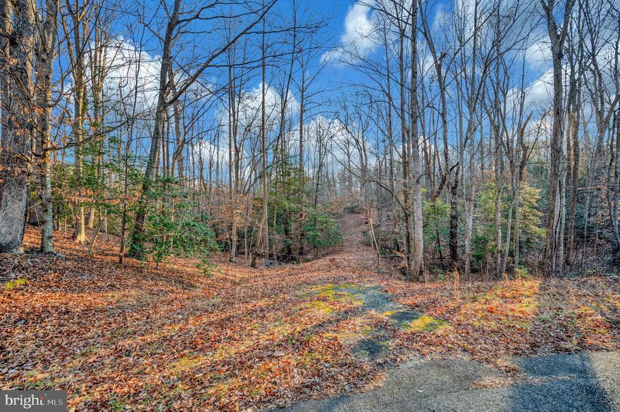 3.425 Acres Improved Land – North Stafford | No HOA
Address: 93 Dent Rd, Stafford, VA 22554
Subdivision: Cobblestone (Non-HOA)
Zoning: Agricultural
Beautiful 3.425-acre parcel in sought-after North Stafford with major improvements already completed. The property features partial clearing for potential home and septic site and a cleared gravel driveway for easy access, culvert already installed.
Survey and soil studies have already been completed, septic permit was issued and now expired (buyers can reapply) but provides valuable information for potential buyers saving time and upfront costs. Stafford County public water hookup is available, making this an excellent opportunity for future residential use. 3.425 acres, Agricultural zoning A1, Non-HOA subdivision
Survey & soil work completed in documents of this listing for review. Public water hookup available. Convenient Location: Minutes to I-95 and Route 1, near Stafford Hospital, easy access to Quantico and FBI Academy
Ideal for building now or holding as an investment — improved land in a prime location with no HOA restrictions.