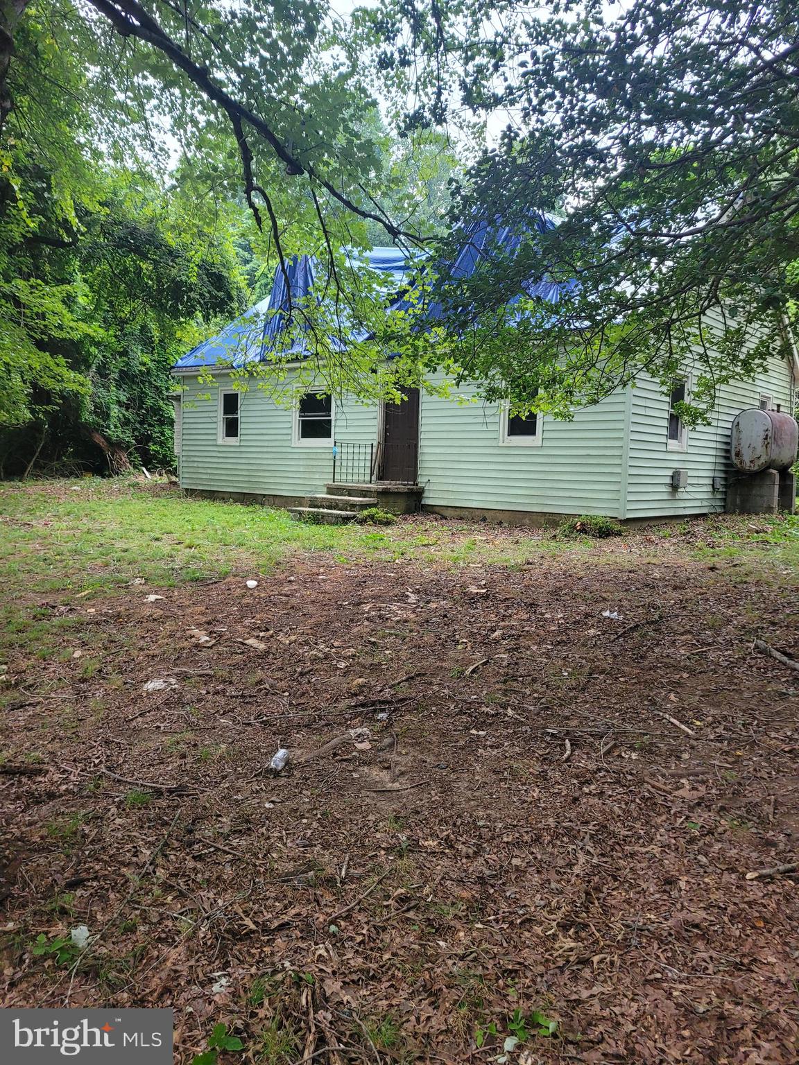 Looking for a hideout where you can live peacefully, away from all the noise and racket, and grow your own vegetables? Want to host parties and not have any neighbors complain? Well, take a look at this newly available property; and when we say take a look, we mean breakout your treasure map! This one is private - tucked so far back off the road that it’s easy to miss. But that’s the secret sauce. You will not find a home at this price with this much privacy. Yes, it needs some TLC, but once complete, you can do your own thing back here. In case you already don’t know, the property is really close to Eagle Harbor, where there are plenty of fishing, boating, and swimming activities for those hot summer days .
Hurry and see this one before it’s gone because this price is simply unheard of in this area.