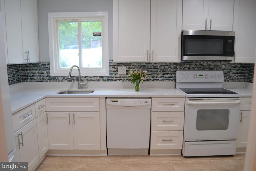 Beautiful Detached Rambler in Sought after Community of Barcroft Hills! This Spacious home has over 2000 Square Feet of Living Space. 4 Bedrooms, 2 Full Baths, This home has a Remodeled Kitchen with Granite Counter Tops, Quality Appliances and Lots of Cabinet Space! Enjoy your remodeled bathroom with a walk-in shower and soaking tub.  This home includes Updated Plush Carpet, ceramic tiles, a wood-burning Fireplace and is Freshly Painted.  This Home is a MUST SEE!!!  Schools -  Belvedere Elementary / Glasgow Middle / Justice High School