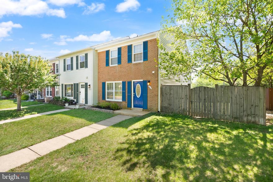 Fantastic townhouse in Manassas! It's a charming home with abundant natural light. The open concept living room and dining room with access to the fenced-in backyard and patio is great for quiet nights in or for having friends over. A highlight is the feature wall with a wood burning fireplace with space for a TV above and built in shelves on either side. Kitchen with double window overlooking the front yard is charming. The main level also features a half bath and a foyer. Upstairs there are three bedrooms and two full bathrooms including the spacious primary suite with new ceiling fan. Parking - two assigned parking spots in front of the home, visitor spots, street parking, and overflow parking spot available for purchase from HOA. New roof in 2020 with 40 year architectural shingles. Home has been very well maintained – pride of ownership is evident. The community backs to Rose-Lewis Regional Park and Innovation Elementary School. This one is a true must see!