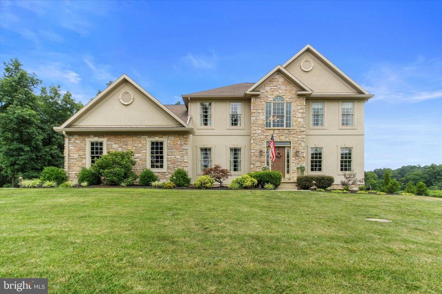 Custom built home with ALL the upgrades.  4 bedrooms with 2 full baths and 2 half baths.  Primary suite includes whirlpool tub and shower, walk-in closet, plus a sitting/dressing area.  SS appliances and granite counters with breakfast bar & nook and large LR off the kitchen with gas fireplace.  Hardwood and ceramic tile throughout.  In-ground pool with pavers and wrought iron fence for great entertaining and very private setting.  Back covered patio includes a hot tub and private area.  Basement is finished with large entertaining area, exercise area, and wet bar.  This is a must see home!!