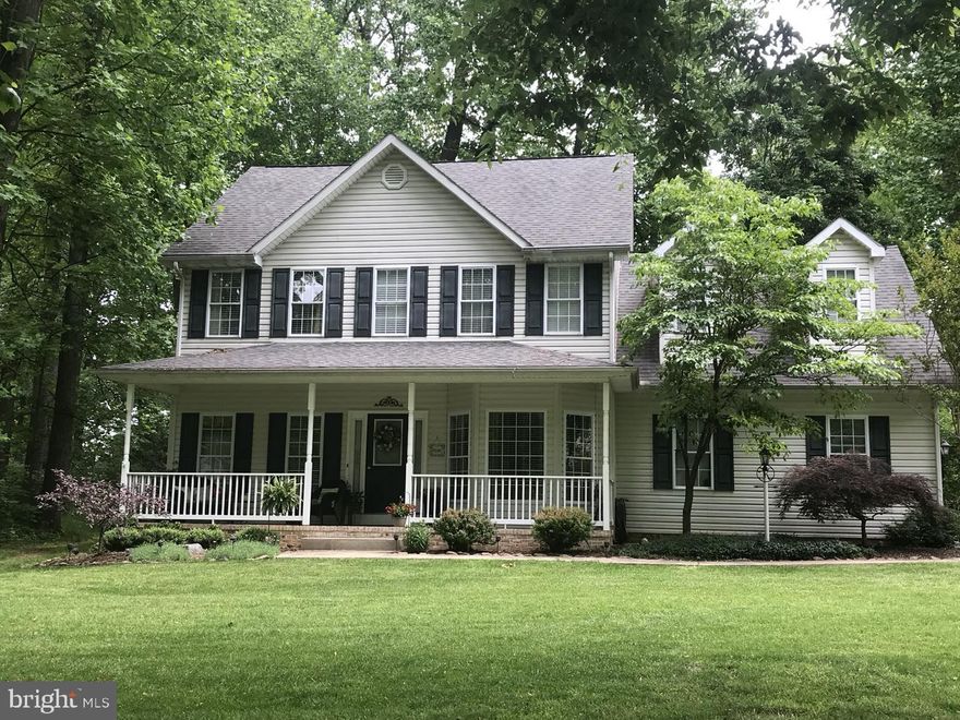 Welcome to the tranquil retreat of Stoneleigh Subdivision! Nestled at the end of a serene cul-de-sac, this freshly painted captivating colonial residence offers a harmonious blend of comfort and privacy. Boasting a 2 car Garage, four bedrooms and two and a half baths, this spacious abode is an ideal haven for both relaxation and convenience. As you arrive, you'll be greeted by the charming allure of a covered front porch, perfect for enjoying your morning coffee or greeting guests with warmth. Step inside to discover the timeless elegance of recently refinished hardwood floors that grace the main living areas. The heart of the home unfolds into a generously sized kitchen with a center island giving ample cabinetry and granite counter space.  Adjacent to the kitchen lies the inviting living spaces, where gatherings and everyday living seamlessly converge.  Retreat to the comfort of the upper level, where four well-appointed bedrooms await, adorned with a recent carpet improvement. The primary suite offers a peaceful sanctuary, complete with an ensuite bath and nice sized walk-in closet. Step outside to discover a true oasis awaiting in the backyard. A large screened-in patio beckons for al fresco dining or simply unwinding amidst the serenity of nature. Surrounded by lush greenery, the backyard offers a secluded retreat for outdoor enjoyment and entertainment. With its desirable location, and serene surroundings, this colonial residence in Stoneleigh Subdivision presents an unparalleled opportunity to embrace a lifestyle of comfort, convenience, and tranquility. Don't miss your chance to make this your own slice of paradise!