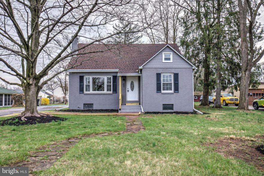 Welcome to this beautifully updated 4-bedroom, 1-bathroom Cape Cod-style home nestled in a quiet residential neighborhood of Birdsboro! This attractive home features a painted brick facade with cottage-style charm and has been thoughtfully renovated to offer modern amenities while maintaining its classic appeal. Inside, you’ll find plenty of natural light streaming through large windows, highlighting the refinished hardwood floors throughout. The spacious sunroom, complete with tile flooring, provides the perfect place to relax and enjoy views of the peaceful backyard. The brand-new kitchen is a chef's dream with stunning quartz countertops, ample counter space, sleek stainless steel appliances, and a stylish subway tile backsplash. The full bathroom is tastefully appointed with a new vanity and a tiled tub/shower combination, adding a modern touch to this home’s character. With two bedrooms conveniently located on the main level and two additional bedrooms upstairs, there’s plenty of space for family and guests. The home also boasts a brand-new electric heat pump, ensuring efficient heating and cooling for year-round comfort. The clean, unfinished basement offers practical storage and potential for expansion, while the large flat lot features a spacious shed for additional outdoor storage. This home is vacant and easy to tour. It’s truly move-in ready—come see how this beautifully renovated home could be yours today!