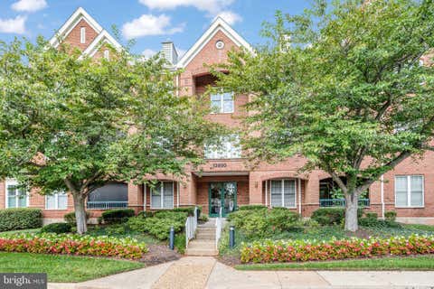 Photo of 13890 Chelmsford Drive #305, GAINESVILLE, VA 20155 (MLS # VAPW2126016)