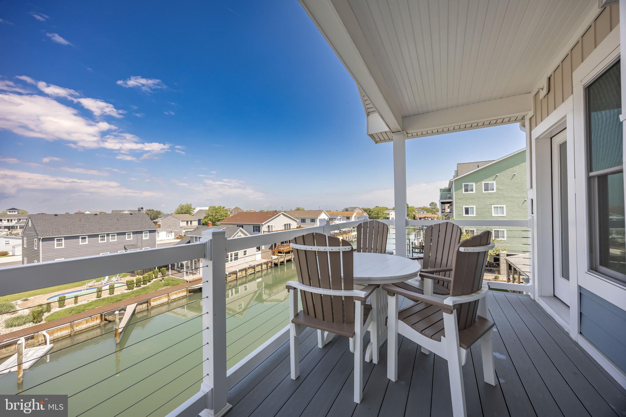 Boat Slip included with Purchase for Limited Time !! Absolutely Stunning Villas MOVE IN READY in Ocean City! This MOVE IN READY Villa showcases an open concept perfect for entertaining! LVT through the main living areas set the tone for the tastefully designed space. Let's get cooking! Stainless Steel Appliances, White Kitchen Cabinetry with Soft Close, Quartz Countertops, Recessed Lighting, and an Electric Stove make cooking and cleanup a breeze! With so many amazing places to enjoy your meal, Morning Breakfast/ Brunch in the Dining Area or Kitchen Island, Relax with Morning Coffee on the Deck overlooking the Beautiful Bay Views. Time to unwind and Snuggle up for a movie by the Fireplace after a long day soaking in the sun. Primary Suite Boasting Walk in Closet, En - Suite with Soaking Tub, double vanity and access your private Deck. This sprawling Villa Showcases 3 Other Bedrooms and 3 Full Baths. Not that you should ever need to leave this amazing Space but if Sunshine is what you are looking for... Take in All Ocean City has to Offer with just a short Walk to all the Major Attractions. Headed back from the beach and don't want to bring the sand inside? Rinse off in the Outdoor Shower. Covered Parking to keep your car cooler on those hot summer days! Take Advantage of dock access to our Private Boat Slips with Electric & Water available with purchase for a limited time! Welcome Home to Son Ray Villas! ** Furnished Unit Options Available.