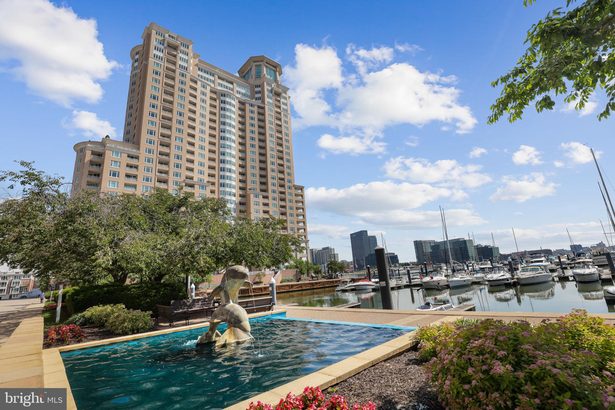 SELLER INCENTIVE - $10,000 Closing Credit! WATERFRONT RESORT-STYLE LIVING at The $10,000 SELLER INCENTIVE *** $10,000 CLOSING CREDIT!! HARBORVIEW MARINA & YACHT CLUB! IMPRESSIVE VIEWS capture the Inner Harbor waterways and the excitement of city life! Welcome to this luxury condo through a French double-door entry where the quality interior includes marble floor accents in the foyer, gleaming hardwood floors, spacious living room/dining area, beautifully remodeled custom gourmet kitchen with quality light wood cabinetry, granite counters, stainless upgraded appliances, custom niche shelving, and decorative lighting. Spacious kitchen allows for breakfast area with spectacular prime window seating every day! This home offers a desirable floorplan with two private bedrooms, each with it’s own full bath. It’s spacious with 1,570sf. The Main Suite features a large bay window, balcony entrance, large walk-in closet with custom finishes. In the Main Bath you'll find a whirlpool tub, shower stall, marble surround accents, double bowl vanity and bright accent lighting. The second bedroom features private balcony and built-in closet shelving. Comfortable living with two balconies for all-year indoor and outdoor entertaining enjoyment! Harborview Towers offers an array of amenities and services that offers a lifestyle you will appreciate… 24/7 front desk concierge with garage valet, on-site security staff, 24/7 extensive fitness center, in/out-door pools, steam/sauna, guest suites, social lounge, billiard room, dining and business rooms, bike storage, beautifully landscaped grounds, walking/jogging paths, on-site gourmet deli, water fountains, marina, garage and guest parking! Excellent location near downtown business district, MARC train, BWI International Airport, stadiums, nightlife and shopping! A MUST SEE!!