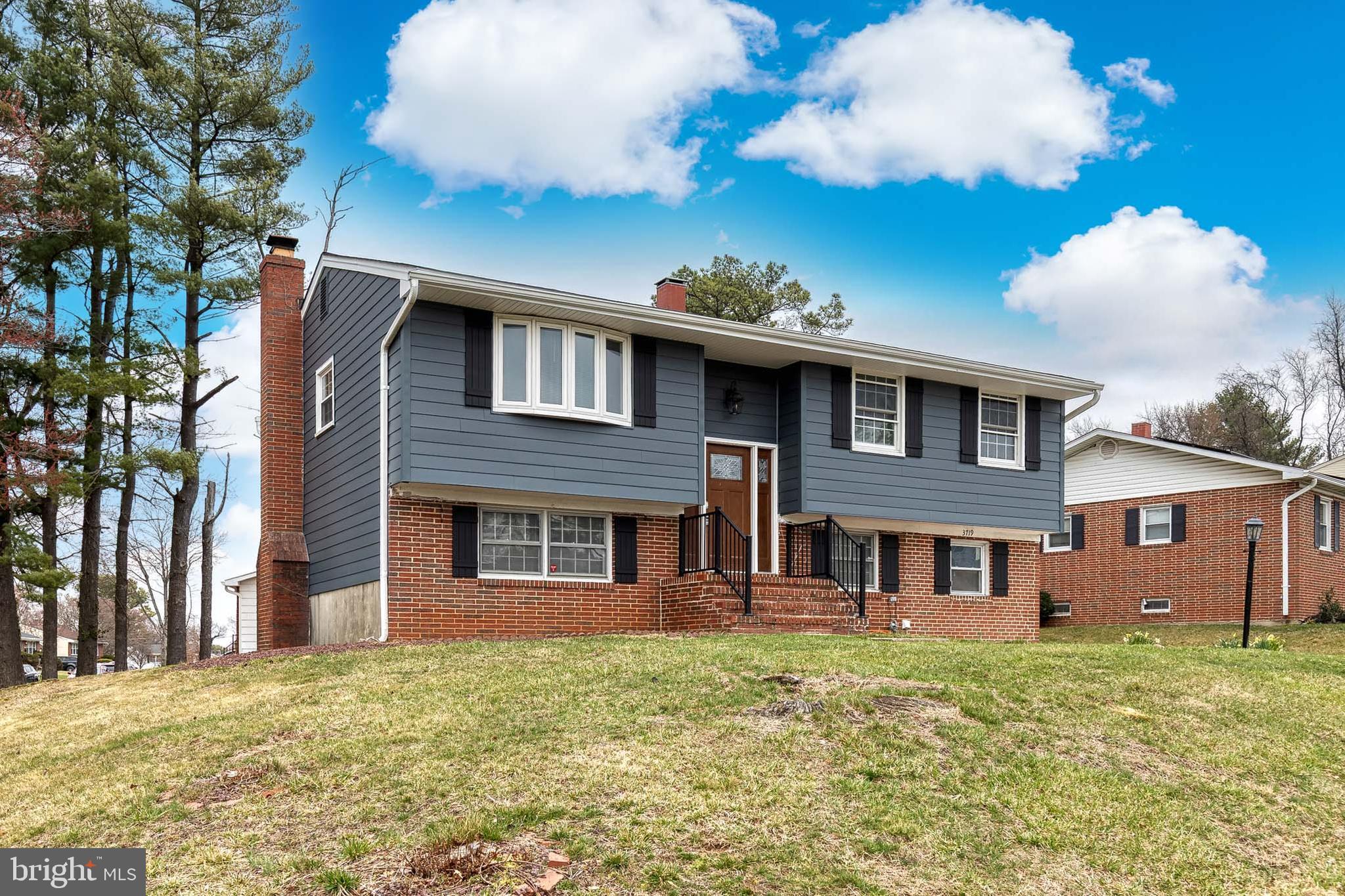 If you are looking for a fully remodeled home in a park like setting, this is it! Pull into your oversized newer driveway that easily fits 3 cars. The front entrance is a split foyer style that leads up to the oversized living and dining room with refinished hardwood flooring and the beautifully updated kitchen with new stainless steel appliances, custom tile backsplash, and new granite counters. There is plenty of space for a kitchen table or moveable island, so bring your imagination and make this home your own! Down the hall are three generously sized bedrooms with hardwood floors, lots of sunlight from the updated windows, and plenty of closet space. The hall bath has been updated with a new vanity and custom tile work. In the lower level there is a 4th bedroom and full bath plus a family room for entertaining. This space leads outside to the new patio space which will be an ideal spot for a family BBQ! Off of the family room is the utility/laundry and storage room and that leads you into the finished garage space that is now the perfect playroom, game room, or anything else you can think of. Welcome home!