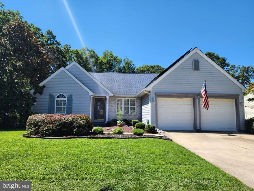 DREAM BIG!!  Rancher style home that does not lack on space. Walk in to a nice, open floor plan with 3 bedrooms and 2 full baths on the main level.  The primary bedroom can be considered it's on "wing" of the house with a large bathroom, as well as doors leading out to the expansive screened in deck.  There is also access to the deck off of the kitchen which was just freshly painted for the new tenants.  Laundry can be found on the main level as well which leads out to the extra large 2 car garage. The basement is fully finished with 2 additional rooms that could be used as bedrooms and a half bath.  The main living space of the basement leads out to the lower level deck and backyard.  The backyard is fenced in and backs to woods for privacy. Carpet on the main level has been replaced, carpet in the basement has been professionally deep cleaned, fresh paint in the primary bedroom as well as the kitchen and a lot of additional updates throughout the house. Solar panels help you save on your BGE bill.  A fixed amount will be added to monthly rent for the leasing of panels.