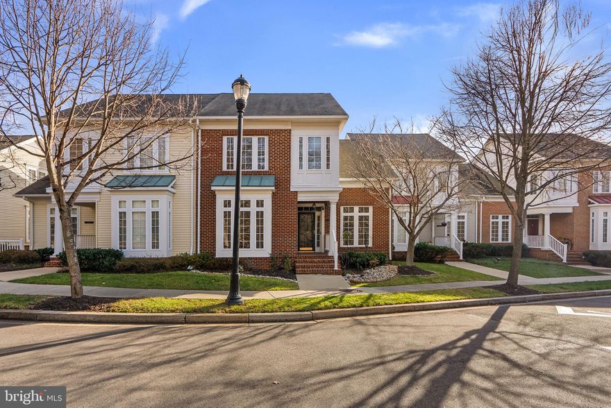 Must see 2-car garage, 3 finished level villa in sought after Ellicott Hills! Perfect move-in condition features: freshly painted w/designer 2025 Sherwin Williams color of the year; brand new carpeting throughout (2025); gleaming hardwoods on the main level; tall 9' ceilings; gourmet kitchen w/42" cabinets; quartz counters, upgraded stainless steel appliances, center island, tile backsplash and pantry; great room off the kitchen w/soaring cathedral ceilings; bright sunroom w/tile floors; elegant dining room w/chair rail and crown moldings; 1st floor study or open living room w/tall vaulted ceilings; 1st floor primary  bedroom w/2 closets (1 walk-in) and an en suite full bathroom w/double sinks, soaking tub and separate shower; 1st floor laundry room, powder room and mudroom leads to the oversized 2 car garage w/ramp entrance to the main level; upper level w/2 spacious bedrooms, 1 full bathroom and an open loft ideal for a home office; expansive fully finished lower level w/huge rec room, built-ins, 3rd full bathroom and large storage room w/built-in shelving and sink; recently replaced water heater; warm gas heat; extensive recessed lighting package; relax on the fenced in rear patio w/easy access from the sunroom. Endless 55+ community amenities and social activities including: tennis, swimming pool, exercise rooms, sauna, meeting and gathering rooms w/warm gas fireplace, gated entrance and community clubhouse. Check this amazing home and community out today!