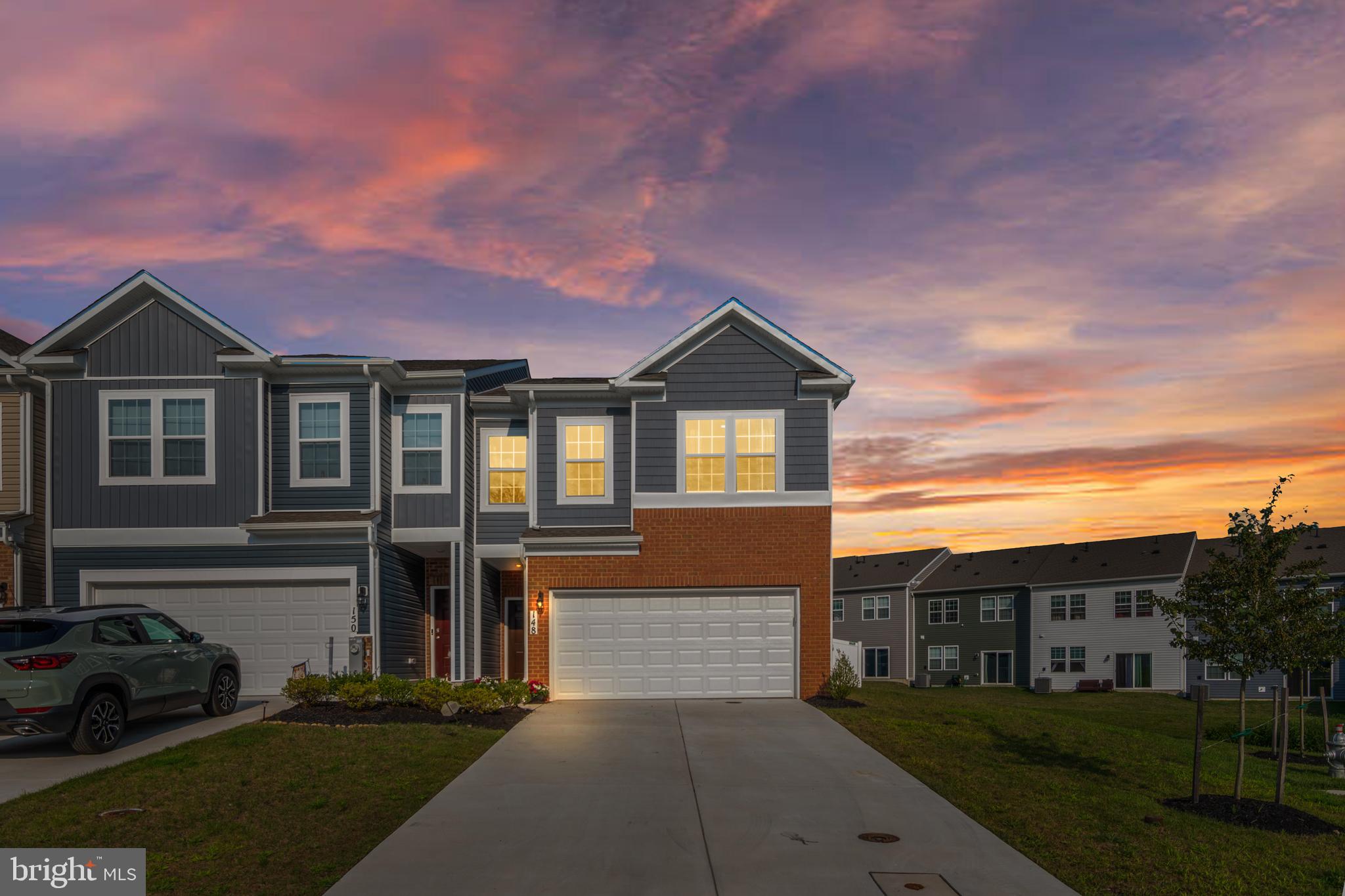 Beautifully maintained and move-in ready 4BR/2.5BA end-unit townhome in sought-after Greenway Farms! This home sits on one of the largest lots in the community, offering a fully fenced yard with ample green space—perfect for outdoor living. Inside, enjoy an open-concept layout with luxury vinyl flooring, recessed lighting, and a smart home package for added convenience and security. The main level features a spacious living area and a chef’s kitchen with quartz countertops, herringbone tile backsplash, stainless steel appliances, and a large island with seating. Upstairs boasts a versatile loft, laundry room, three generous bedrooms, and a full bath with dual sinks. The primary suite offers a walk-in closet and private bath with double vanity and walk-in shower. Additional highlights include a 2-car garage, double driveway, and easy access to shopping, dining, and commuter routes. **1-Year Home Warranty Included! **