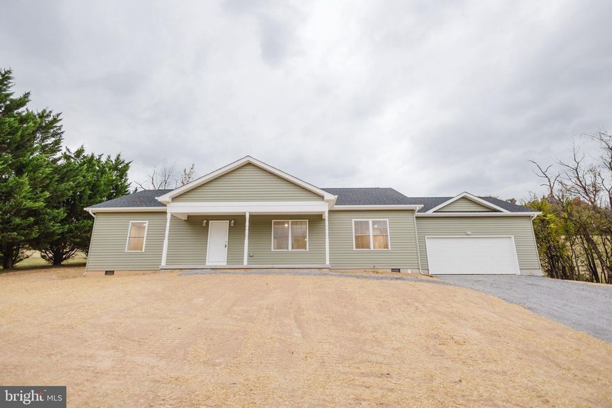 Welcome to this beautiful new construction home located at 12493 Back Creek Valley Road in Hedgesville, WV!   This modern 3-bedroom, 2-bath ranch offers stylish finishes and comfortable one-level living on 0.75 unrestricted acres.  Step inside to find an open-concept floor plan featuring luxury vinyl plank (LVP) flooring throughout, a bright living area, and a spacious kitchen with stainless steel appliances, custom cabinetry, and plenty of counter space.  The primary suite includes an ensuite bath and walk-in closet, while two additional bedrooms and a second full bath provide ample room for family or guests.
Outside, you���ll enjoy the freedom of unrestricted land — perfect for outdoor living, a future garage, workshop, or small homestead setup. With new construction peace of mind, quality finishes, and a convenient location just minutes from Hedgesville amenities, this home offers the perfect blend of modern comfort and country charm.