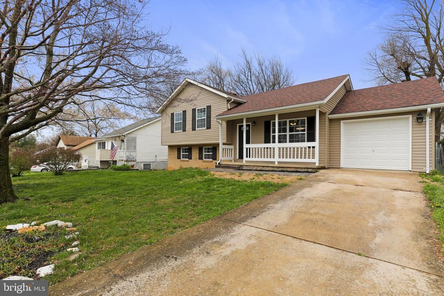 Newly renovated in perfect convenient location just off Route 340 in Charles Town.  Close to all shopping, downtown, Frederick MD, or Northern VA.  Home is in GREAT shape with newer roof, windows, HVAC, cosmetics including floors, appliances, garage door, cabinets, carpet, patio, lead walk and much more.  Great split level design with just a few stairs separating the main level from bedroom level or lower finished rec room.  Bedrooms are nice sized and family room on main level offers great living space.  The lower level rec room is perfectly laid out for fun.  Community of Patrick Henry Estates is a nice walkable community.   Home is easy to show!