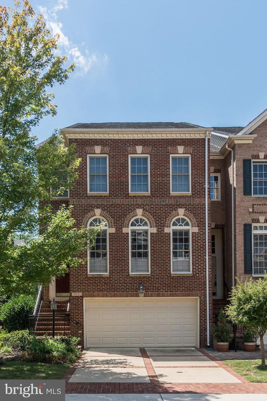 Spacious 4-level end-unit townhome located in River Creek gated community. This light filled home has an open floor plan featuring an eat-in kitchen that opens to the rear balcony overlooking trees and common area, an eat-in gourmet kitchen with stainless appliances including double ovens,  elegant dining & living rooms with hardwood floors.   On the upper level, the master suite offers a private balcony with views of trees to the rear & a spa-like master bath with soaking tub, double sinks, separate shower stall, and 2 additional bedrooms and full bathroom.  There is a 4th level with a large bedroom (or den) and a full bath, perfect as a mother-in-law suite.  On the lower level, you will find a large family room with built-ins,  gas fireplace, and French doors opening to the fenced rear yard overlooking common area.  In addition there's a 2 car garage with storage space.   Enjoy the many amenities in this beautifully manicured  gated community to include pools, walking trails, beautiful community center and more!  Golf memberships available.