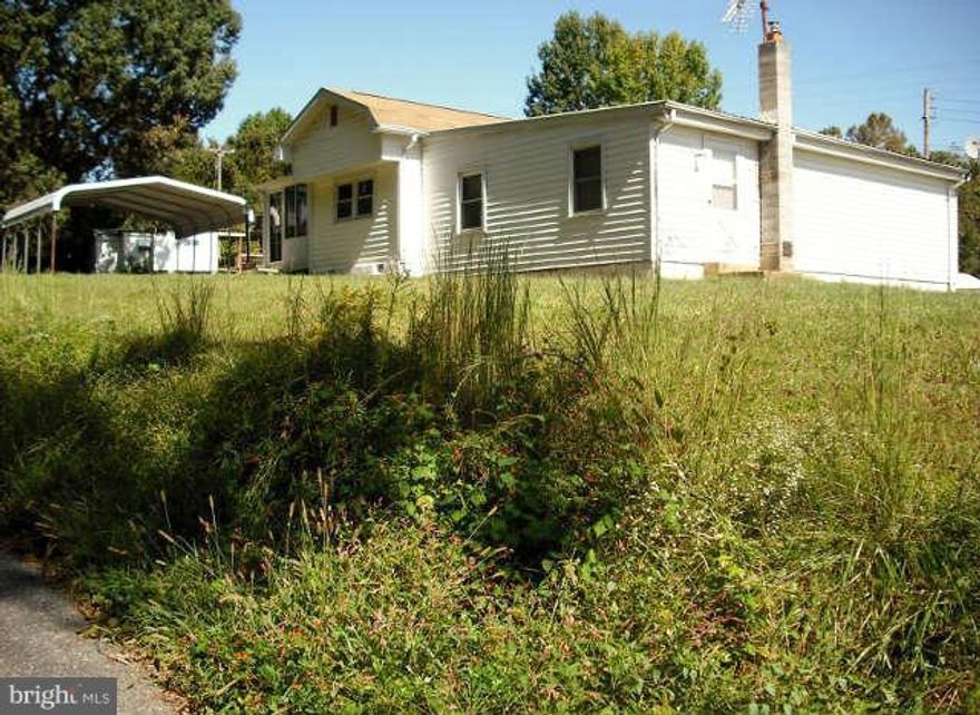 Back on Market!  Well-maintained 3 bedroom, 2 full baths with den and gorgeous sun room. Large deck. Paved driveway with 2 car carport. Nice level lot with almost full acre. Pet deposit in non-refundable. $100 repair deductible. Tenant is responsible for propane gas used.