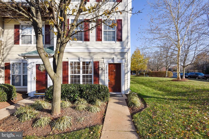 Sought after END UNIT Townhouse Style Condo! Dark walnut wide-plank engineered hwds on main level, boxed bay in LR w/lots of light, gas fireplace, & slider to patio. Upgraded Stainless-Steel appliances and room for eating table in Kith. Two bedrooms w/private baths, one with Walk-in closet & outside balcony. Full size W&D on bedroom level. Close to Pool,Tot-Lots. Walk to major shopping areas& more