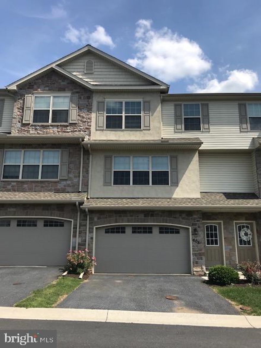 Excellent townhouse available end of September  in the highly regarded Winding Hills community.  Located directly across the street from the multi-million dollar club house and swimming pool! This home offers 3 Bedrooms 2.5 baths, two large living areas, a nicely appointed kitchen with an Island and pantry closet for additional storage, and a 2 Car Garage! Not many opportunities arise in this gorgeous community located in Mechanicsburg School District which is conveniently located off route 15S giving easy access to major routes and shopping!