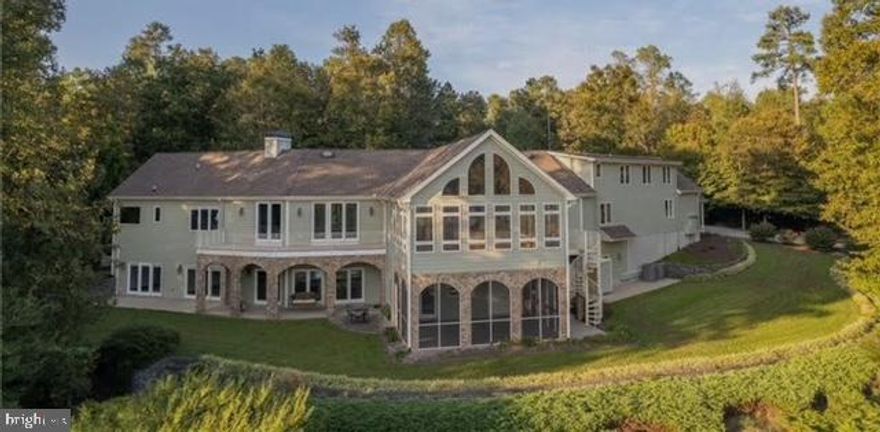 This property has a wonderful view and 33 acres of mostly wooded land. One side is linked to Virginia wetland and the other side has a little dam and a waterfall.   A beautiful  9 acres  private lake with tons of fishes and turtles. There is a  legally built Airbnb business there.   You can enjoy some income while making use of this nature beauty. The listing broker is one of the owners.