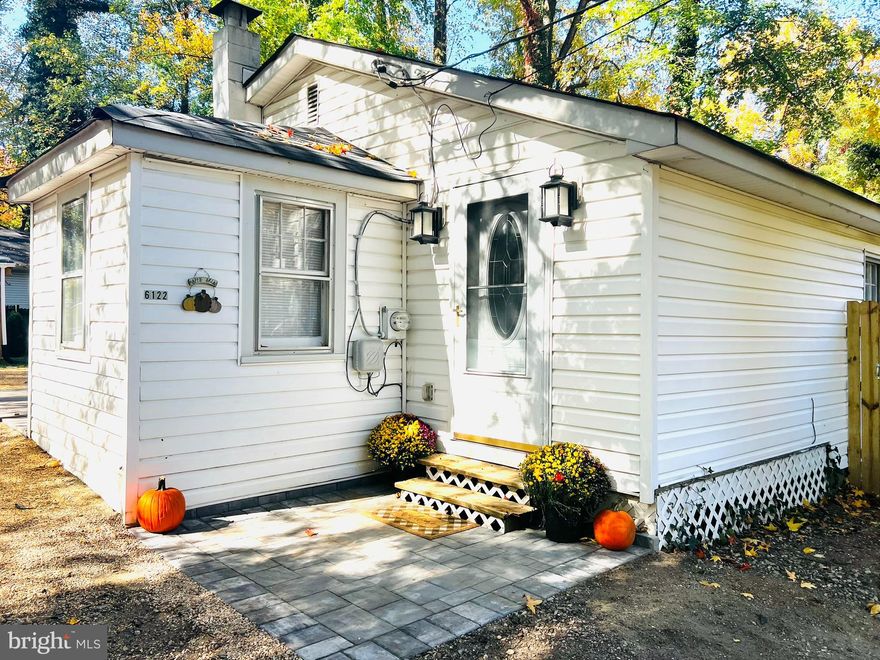 Welcome to charming 6122 6th St, nestled within the Chesapeake Beach community. This home is back on the market with a new well, new roof, covered outdoor living area, separate fenced in yard, and overall refresh. This cozy home features two bedrooms, a remolded bathroom, and a spacious kitchen with lots of storage and brand-new appliances. The open floor plan allows unlimited opportunities for you to transform the space to your specific needs. This home is conveniently located near shopping, commuter routes, and has easy access to the local beaches and boardwalks.