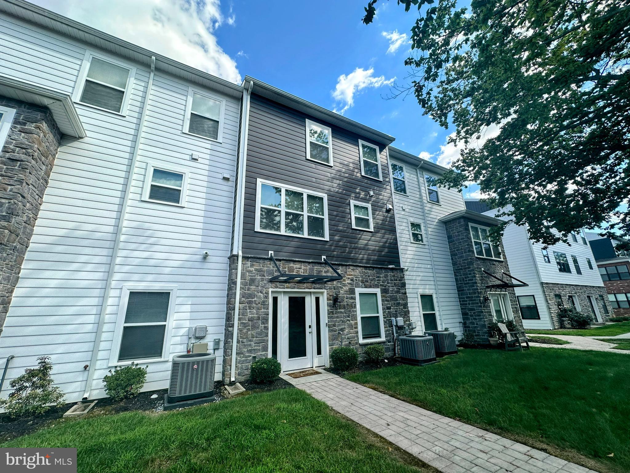 Location, Location, Location! Rare opportunity to own a 3-bedroom townhome near Hershey Medical Center and only a few miles from Hershey Park, restaurants, shopping, and major commuter routes. Main Courtyard Collection — 2 of only 12 units. This modern, high-tech home is designed with today’s lifestyle in mind. The open floor plan features luxury vinyl plank flooring, granite countertops, and stainless steel appliances. Smart-home upgrades include a keyless entry system and an iPad control panel to simplify daily living. Enter through your 2-car garage into a versatile bonus room with views of the courtyard—ideal for a home office, fitness space, or second living area. The second floor offers a spacious living room, half bath, kitchen with island seating, gas range, dining area, and a private deck. On the third floor, you’ll find a primary suite with en-suite bath and a large closet, two additional bedrooms, a second full bath, and convenient laundry area. The HOA covers water, sewer, trash/recycling, landscaping, and snow removal. Community amenities include a clubhouse, fitness center, gazebo, BBQ decks, courtyard, and more. Don’t miss this rare 3-bedroom opportunity in High Pointe at Hershey—schedule your private tour today!