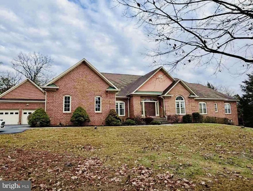 Situated on a prime corner 2-acre lot in the Palatine community, this custom sun-filled home offers space, elegance, and timeless design. Lovingly maintained by its original owners, it features 6 bedrooms, 4 full baths, 2 half baths, and a rare 5-car garage.

The main level boasts hardwood floors, arched hallways, vaulted and tray ceilings, and abundant natural light from skylights. Formal living and dining rooms are ideal for entertaining, while the family room features a striking stone fireplace. The primary suite offers deck access and serene views.

Also on the main level: 3 additional bedrooms, 2 full baths, 2 half baths, a private den/office, and an eat-in kitchen opening to an enclosed screened porch.

The finished walkout lower level includes multiple recreation areas, a wet bar, 3 bedrooms, and 2 full baths—perfect for guests or multi-generational living.

Updates include newer HVAC, a 1-year-old water heater, and a roof approx. 6 years old. Estate sale, sold strictly as-is.