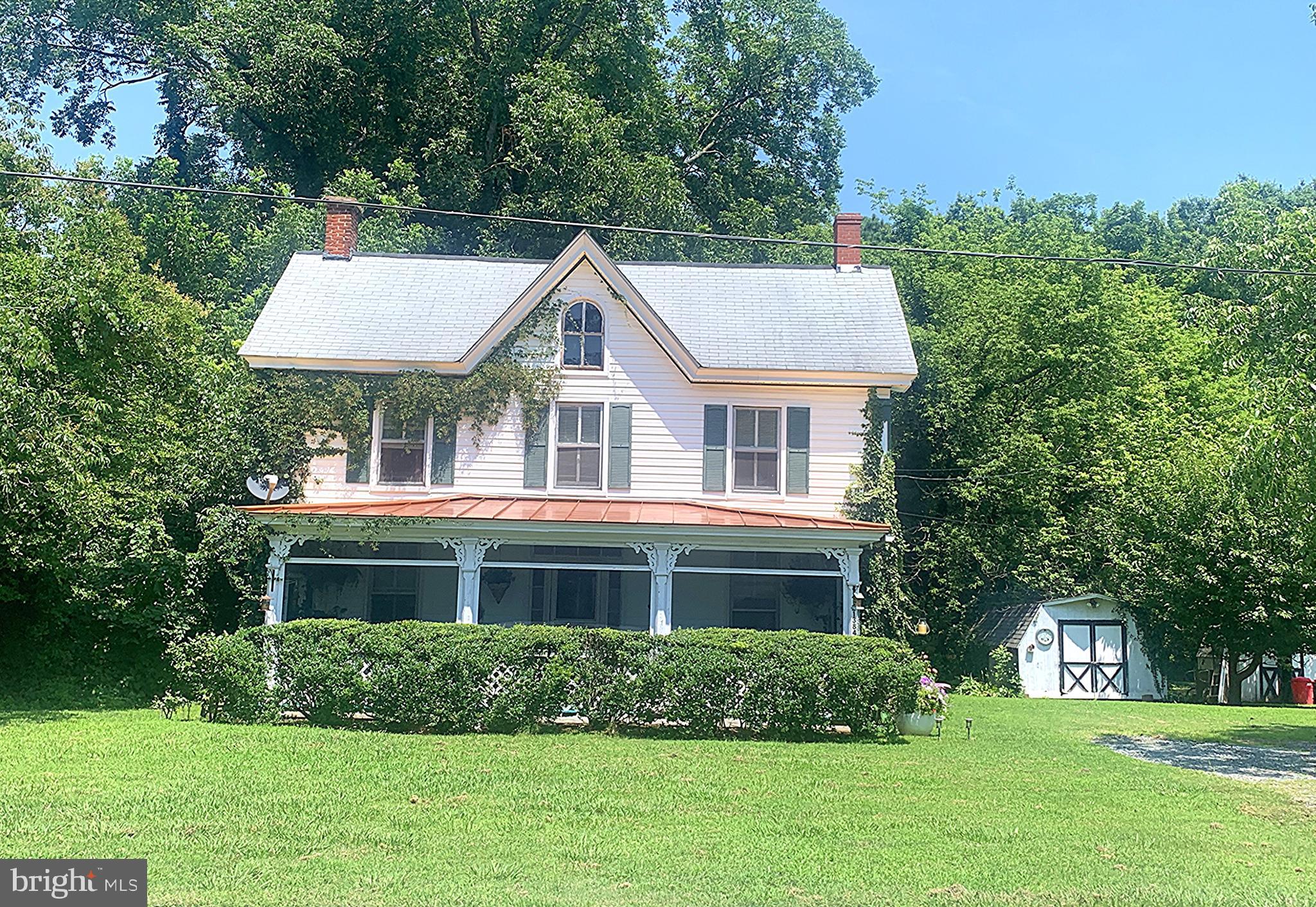 Built in 1900 and thoughtfully renovated in recent years, this 3-bedroom, 2-bathroom colonial blends timeless character with modern updates. Situated on a 1/3 acre lot, it’s just a short walk to Rock Hall’s Main Street—perfect for enjoying local favorites like Fallfest, Pirates & Wenches Weekend, shops, and dining.
Start your mornings on the screened-in front porch, sipping coffee and taking in the quiet charm of town life. Inside, you’ll find updated bathrooms and a refreshed galley-style kitchen with an adjoining dining area—ideal for cozy meals and entertaining.
An outdoor storage shed offers space for gardening tools or extra storage.
Whether you're looking for a weekend retreat or full-time residence, this Rock Hall gem offers classic charm in a vibrant waterfront town.