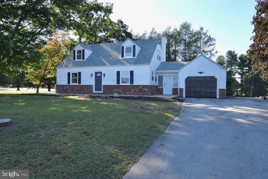 This charming Cape Cod home just went thru an awesome renovation in 2025, offers a perfect blend of classic character and modern comfort. Inside, enjoy the warmth of a cozy gas fireplace in partially finished basement! The eat-in kitchen features stainless steel appliances, including a new self-cleaning oven and built-in range & refrigerator! Your choice main bedroom on 1st floor w/ full hall bath or main bedroom 2nd floor w/full bath!  New rail on 2nd flr, New Windows throughout, owners opened up some walls for open feel, new luxury vinyl plank flooring and freshly painted! Step outside from mudroom to deck and complete with a fenced, in-ground pool w/patio/stone surround. The attached garage with brand new door and ample driveway space provide plenty of parking/turnaround. Owners just installed brand new HVAC system, brand new Roof and made repairs to Septic as required.  Located in the Avon Grove School District, grab a lawn chair and watch the football games from your front side yard! You'll appreciate nearby parks, excellent schools, and convenient to DE, MD and Route 1 for travel and shopping! 1st floor living with No HOA fees too!