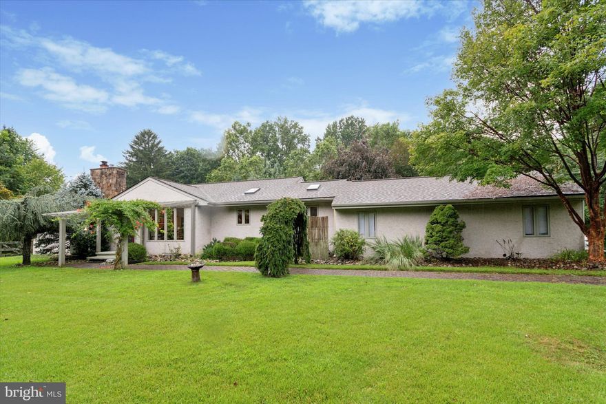 Beautiful ranch home on a scenic 2-acre lot in desirable Chadds Ford. This 3BR, 3BA home offers an open floor plan with hardwood floors, exposed beams, and abundant natural light. Main level includes spacious living area, eat-in kitchen, and dining space—ideal for everyday living and entertaining. Finished lower level features a second kitchen, bedroom, and full bath, perfect for in-law or guest suite. Enjoy outdoor living on the large deck overlooking a private, park-like setting with mature landscaping and fenced yard area. Attached garage and ample parking. Conveniently located near Rt. 52, I-95, Wilmington, and area attractions including Longwood Gardens and Brandywine Valley.