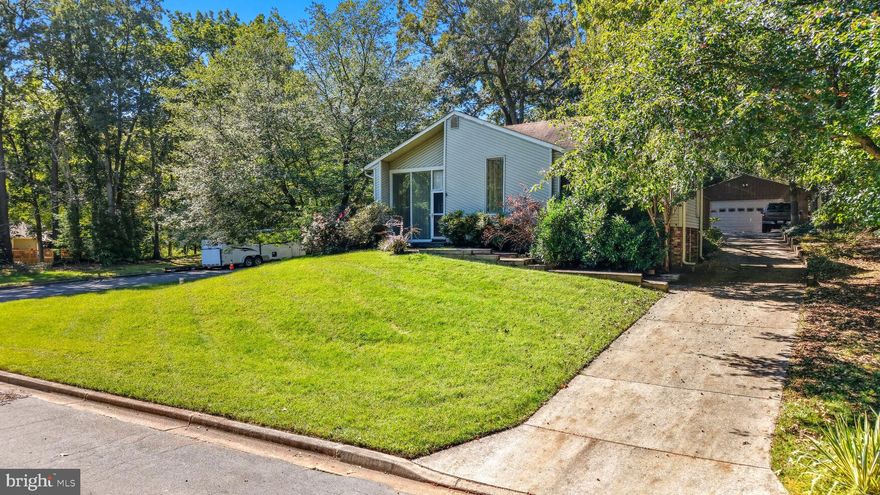 Nestled in the serene enclave of Boulevard Park, this water privileged neighborhood has a private picnic/play area with a club house and boat ramp!  The charming contemporary two-story residence offers a harmonious blend of luxury and comfort, perfect for those seeking a getaway of their own. This lovely home boasts five spacious bedrooms and three beautifully appointed bathrooms, ensuring ample space for relaxation and entertainment. ***Back on the market***Step inside to discover an inviting interior adorned with wood chair railing and elegant wainscoting in the primary bedroom and warm wood floors that create a welcoming ambiance. The heart of the home features a thoughtfully designed combination dining and living area, enhanced by wood floors in all the bedrooms. The living room, conveniently located off the kitchen, is perfect for cozy gatherings, while the kitchen is equipped with energy-efficient stainless-steel appliances, including an ENERGY STAR dishwasher and refrigerator, a self-cleaning oven, and a range hood, making culinary adventures a delight. In the bathrooms, where you can unwind in a stall shower or soak in a jacuzzi jetted tub, with the en- suite featuring a walk-in shower for convenience. Each bedroom is generously sized, with the ensuite offering spacious closets, ensuring that storage is never a concern. The outdoor space is equally impressive, set on a premium 0.55-acre lot that backs to lush trees, providing a tranquil backdrop for outdoor living. Enjoy summer days lounging by your personal in-ground pool, complete with filtration for pristine waters, or host gatherings on the expansive deck and patio areas, perfect for al fresco dining and entertaining. For water enthusiasts, this property offers the members of Boulevard Park access to Grays Creek, where you can indulge in boating, fishing, or kayaking right from your community beach area.* The partially wooded lot features beautifully landscaped areas, a level rear yard, and ample space for outdoor activities, making it an ideal retreat for nature lovers. Additional highlights include a detached garage and long driveway, ensuring convenient parking and storage. With its blend of features and an exclusive lifestyle, this home is a rare find that promises comfort, and endless opportunities for leisure and enjoyment. Experience the perfect balance of tranquility in this remarkable Boulevard Park residence. (There is a low boat ramp key fee yearly of approximately $79. which is subject to change) another bonus is those seeking the great Anne Arundel Schools-Cheasapeake School district.********************** Seller has found a home of choice and desires a quick transaction! PRICE IS $31,000. BELOW APPRAISAL and AS IS PURCHASE!!!