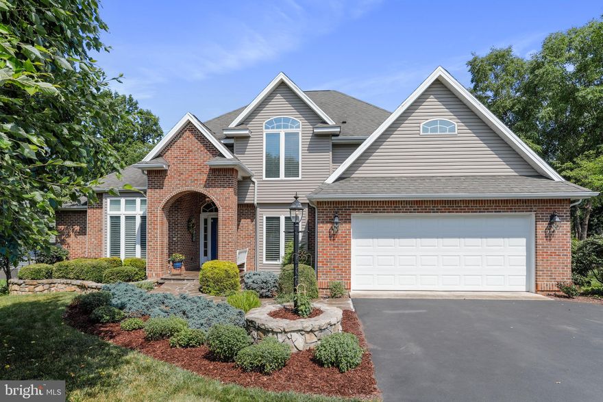 NEW PRICING - $15K Reduction !!! What's not to love about this Custom Buikt Home Exceptional Natural Lighting ? Built without Compromise it reflects the Very Best -  Some of the Features are Main-Level Primary Suite, Gourmet Kitchen w Wine Frig & Pantry, Four Season Sun Room with 10 x 24 Deck,  Great Room with Custom Built Book Shelves, Gas Fireplace, Vaulted Ceilings & Hardwood Floors, Formal Living Room,  & Formal Dining Room The Upper Level consists of  3 Spacious Bedrooms, 2 Full Baths, &  Floored  Attic for Storage.  This Home has been Well  Maintained, Beautifully Landscaped and Majestic Views  of Mountain & Three Fairways. Offers Class A Membership including Golf , Outdoor Pools & Sport Centers w Indoor Pool, Spa, Exercis Room & Much More.  SELLER WILL PAY INTIATION FEE FOR NEW OWNER - $3150.00  TRULY A MUST SEE TO APPRECIATE !!!!