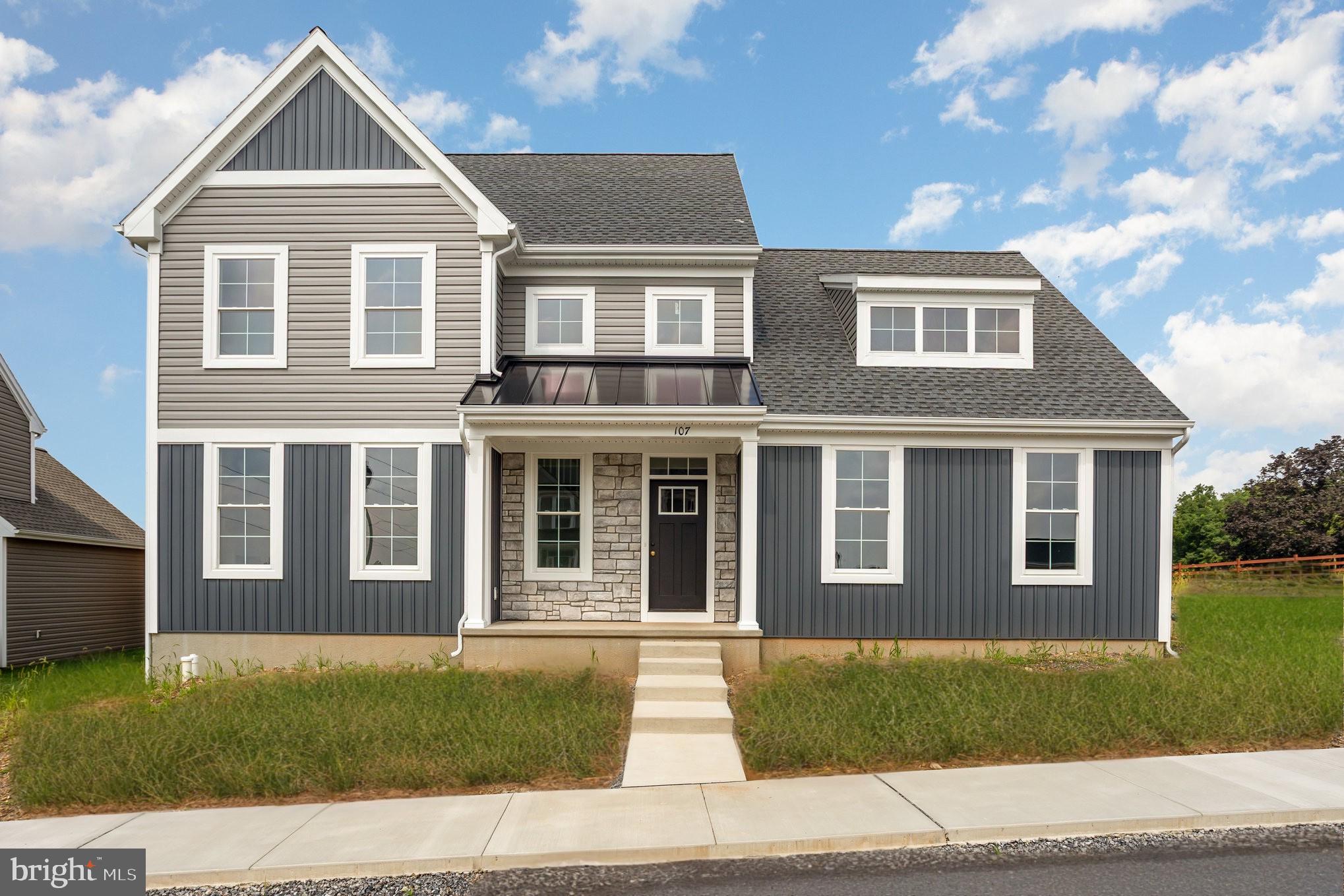 Welcome to Elizabethtown's newest community...Westbrooke Hills! Quality-built homes by Horst & Son Builders, a 3-generation family business with years of expertise and craftsmanship that make home buyers' dreams a reality. Westbrooke Hills is located less than 1 mile from the Rheems/Elizabethtown exit on Rt.283 in Lancaster County, just outside Elizabethtown. The location is ideal for commuters to work, as it is only 15 minutes to Harrisburg, Lancaster, and Hershey and 20 minutes to York.
When you walk into the foyer of this FIRST FLOOR BEDROOM model home, you will be greeted with an open-concept main living space complete with a gas fireplace, stained mantel and shiplap accent wall, kitchen island, half bath, and mudroom off of the 2-car garage. A spacious first-floor bedroom with an attached bathroom with double undermount sinks, tile floor, and tile shower with a semi-frameless shower door, as well as a walk-in closet to complete the main floor living space. Located on the second floor, you will find 3 bedrooms and a full bath with upgraded vinyl plank on the stairs, hallway and hall bath. This home is move in ready!
