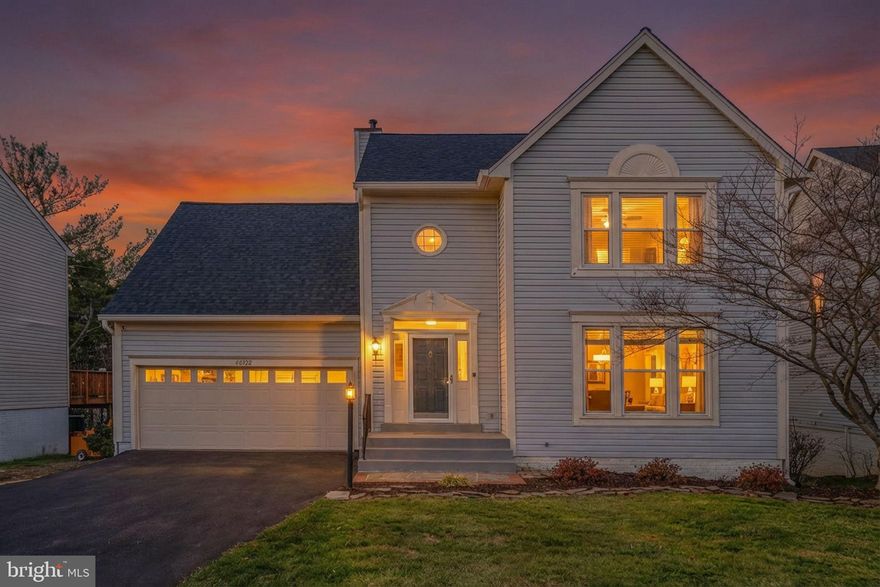 Welcome to your dream home in the heart of The Cascades' Potomac Lake neighborhood, where timeless colonial charm meets modern sophistication.

Set on a quiet, tree-lined street, this beautifully maintained residence offers four generous bedrooms and two full baths on the upper level, creating a serene retreat for rest and relaxation. The main level is filled with natural light, featuring a sunny living room and an elegant dining room, both warm and inviting. Across the back of the home, the kitchen opens to a comfortable family room and a bright sunroom bump-out offering access to the oversized deck and forming an ideal gathering space for both everyday living and entertaining. The finished walk-out lower level expands your lifestyle options with a spacious recreation room with a cozy fireplace, a den or guest room, full bath, and abundant storage. 

This home has been meticulously updated with a long list of meaningful improvements, including a new roof and gutters (2024), new LVP flooring throughout the main level (2024), and new windows installed in 2021. The kitchen was enhanced in 2023 by removing the wall between the kitchen and dining room and adding a new stainless steel refrigerator and microwave. Additional upgrades include a remodeled powder room, refreshed door hardware and bathroom faucets, new deck boards, and a newly paved driveway. 

Step outside and enjoy everything the Cascades community has to offer – pools, sports courts, trails, playgrounds, and more. This home is also walking distance to top-rated schools and the popular Algonkian Regional Park, known for its riverfront trails, golf, biking, and outdoor activities. Situated just minutes from shops, restaurants, parks, and routes 7 and 28, this location delivers the perfect blend of convenience and lifestyle. 

A rare opportunity in one of the area’s most desirable communities—welcome home!