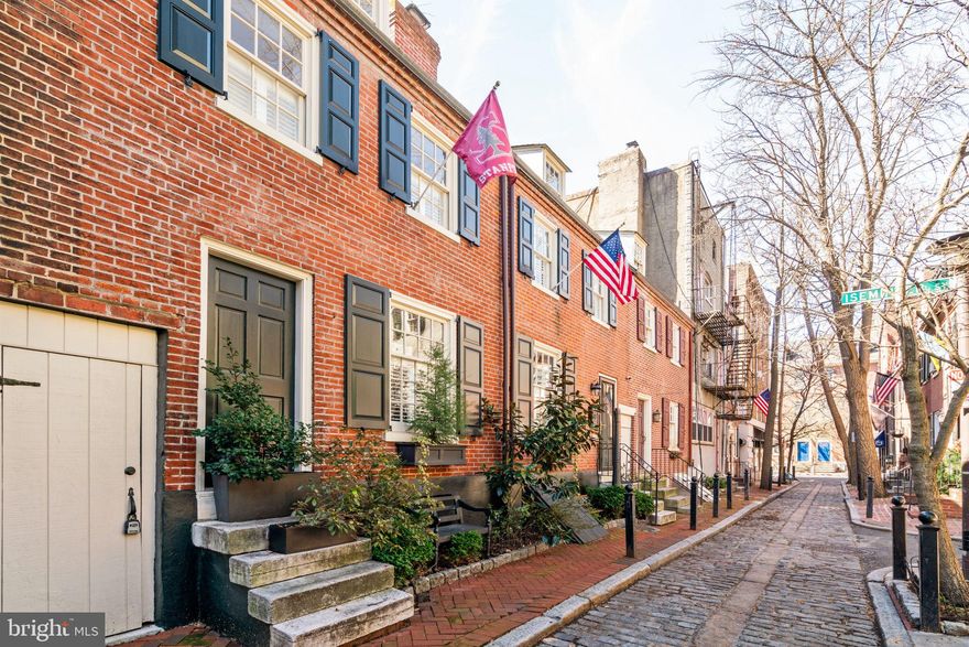 This is a rare opportunity to own a double-wide home at 1216-1218 Panama St, on one of the most desired streets in Philadelphia. Within easy walking distance of dozens of shops and restaurants, this home is at the center of everything yet maintains the quiet feel of an urban oasis. The first floor features a living room with a wood-burning fireplace and a separate dining room with large sliding glass doors that lead to a brick-paved patio with ivy-covered walls. The large eat-in kitchen is equipped with custom cabinets, granite countertops, custom tiling and built-in Bosch, Viking, and Sub Zero appliances. Off of the kitchen are French doors that lead out to the property's 2nd patio. The outdoor space is perfect for outdoor entertaining, morning coffee and al fresco dining! Floor-to-ceiling windows surround the stairs and oversize landings on the way to a lovely, light-filled and open 2nd floor family room with gas fireplace and French doors / Juliet balcony. This room looks out over a neighboring garden. This floor is complete with 2 bedrooms and a full bathroom with a tub. The front bedroom overlooks Iseminger and Panama Streets. The rear bedroom is sun-filled, overlooking the back patio through a bank of windows and includes a large closet. The 3rd floor features a master suite with an open office area with French doors and Juliet balcony. The separate bedroom includes two closets, one being a large walk-in closet and a recently renovated en-suite bathroom with stall shower, vanity and large skylight. The finished basement with another fireplace offers additional sq ft and is perfect for a media room, home gym or home office. There is a separate area of the basement with a laundry area and plenty of storage space. Numerous improvements have been made to this well-maintained and well-loved home over the years, melding modern amenities with historic Philadelphia charm. The owners rent a parking spot a few doors down at the corner of 13th and Pine St which can be transferred to the new owners.