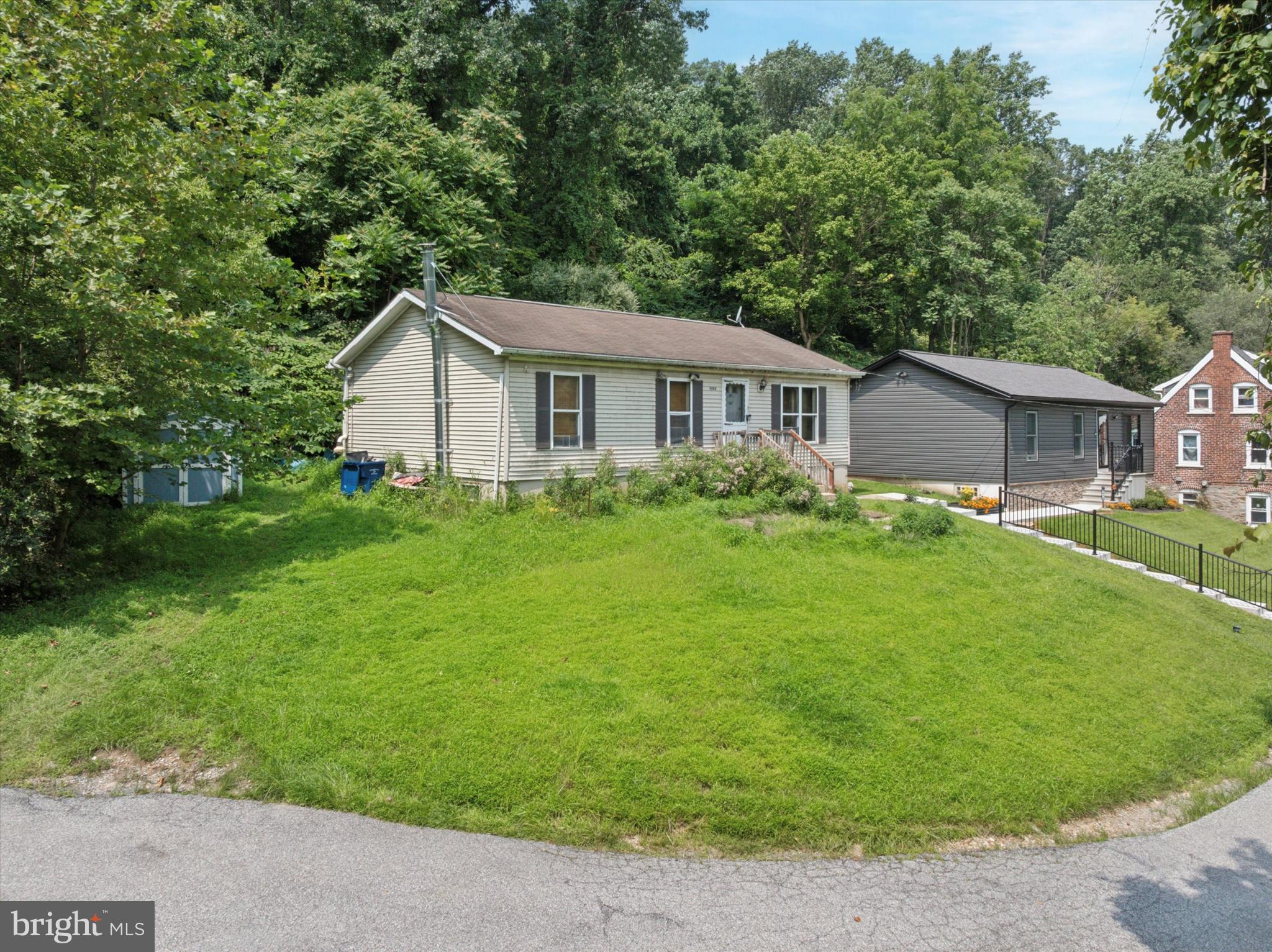 Located in a Conservation Zoning District, this property offers exciting potential. Per township guidelines, conservation zoning requires 5 acres per dwelling, meaning this 13.8-acre lot may be eligible for subdivision and the construction of an additional home (buyer to verify all details with the township and perform their own due diligence).
The home features 3 bedrooms and 2 full baths, with an airy kitchen that boasts a vaulted ceiling—bringing in natural light and creating an open, spacious feel. With some cosmetic updates, this property could truly shine. Whether you're looking for a quiet retreat, investment potential, or a place to make your own, this one has great possibilities.